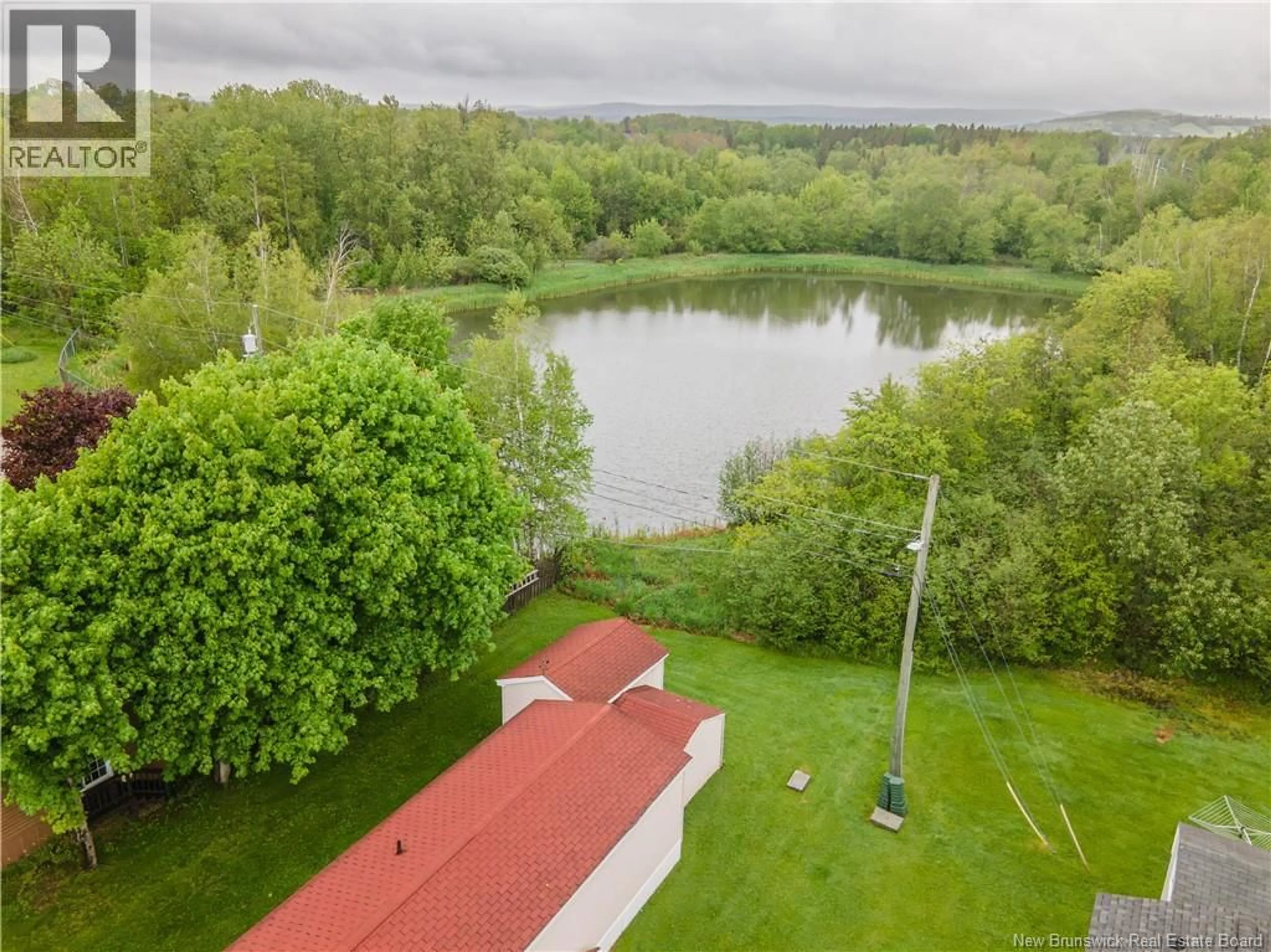 A pic from outside/outdoor area/front of a property/back of a property/a pic from drone, water/lake/river/ocean view for 3 FIFTH STREET, Sussex Corner New Brunswick E4E5Z3
