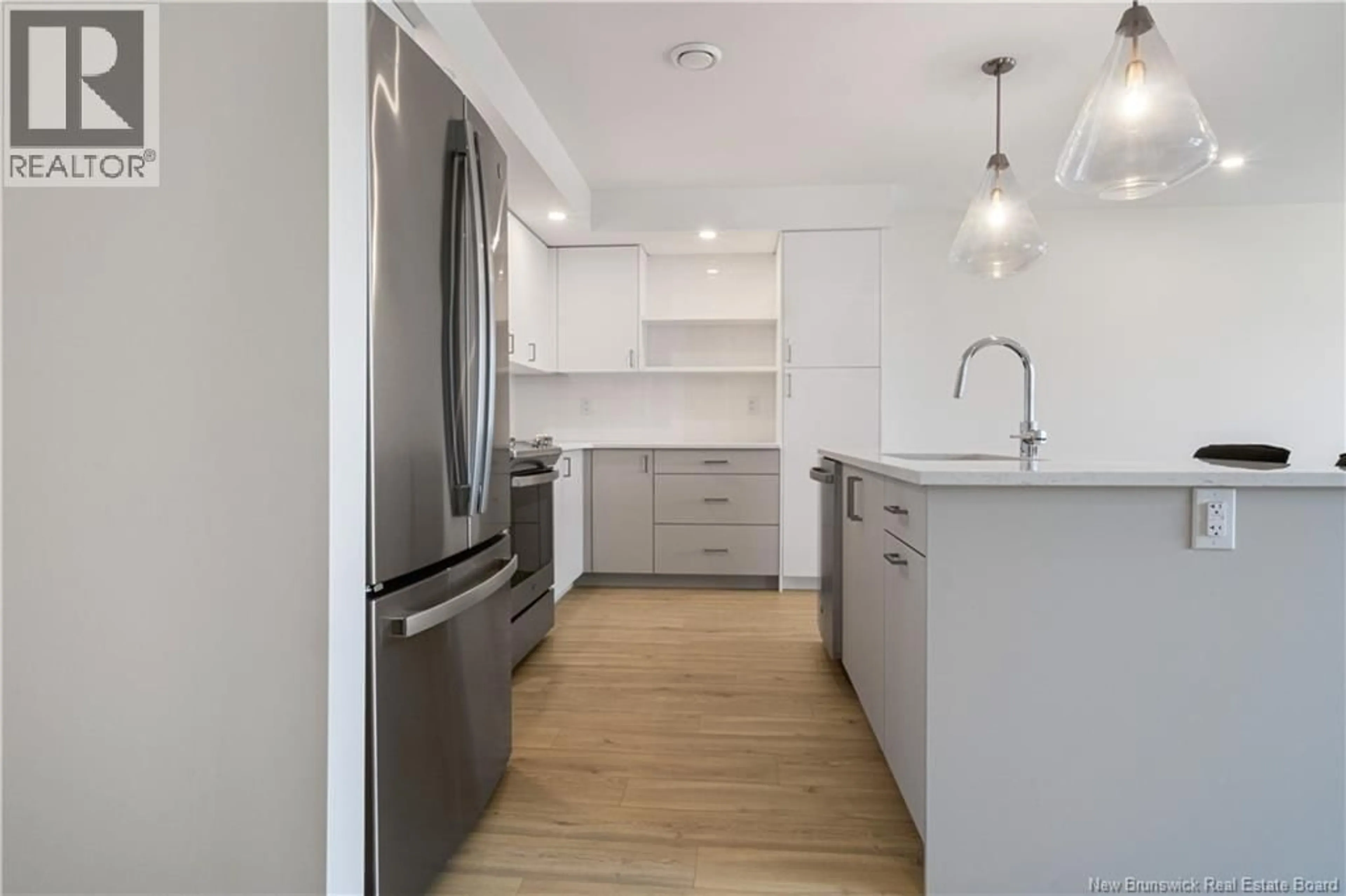 Open concept kitchen, wood/laminate floor for 204 DICKEY BOULEVARD, Riverview New Brunswick E1B0V2