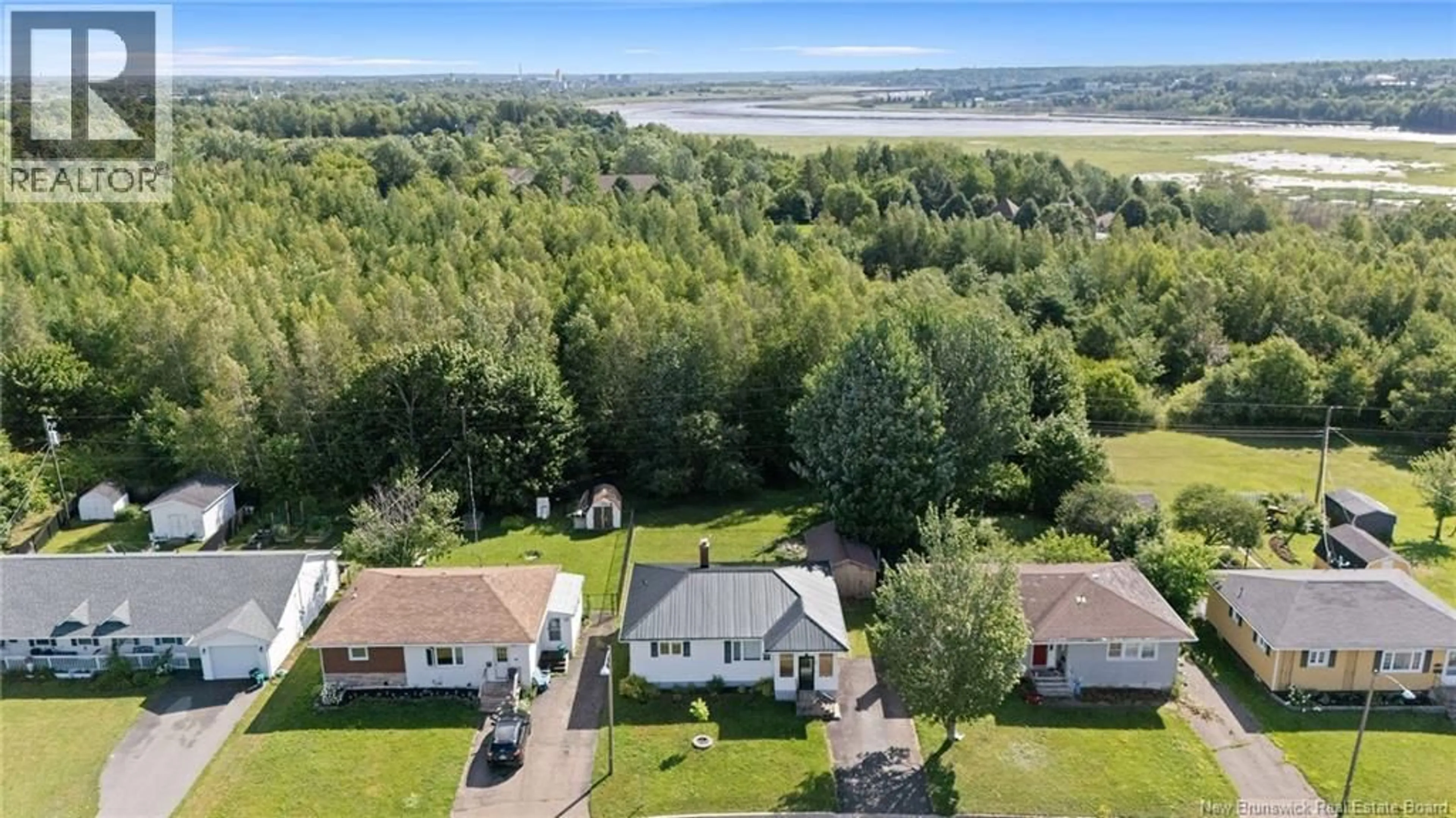 A pic from outside/outdoor area/front of a property/back of a property/a pic from drone, water/lake/river/ocean view for 11 ALICE AVENUE, Moncton New Brunswick E1E2H9
