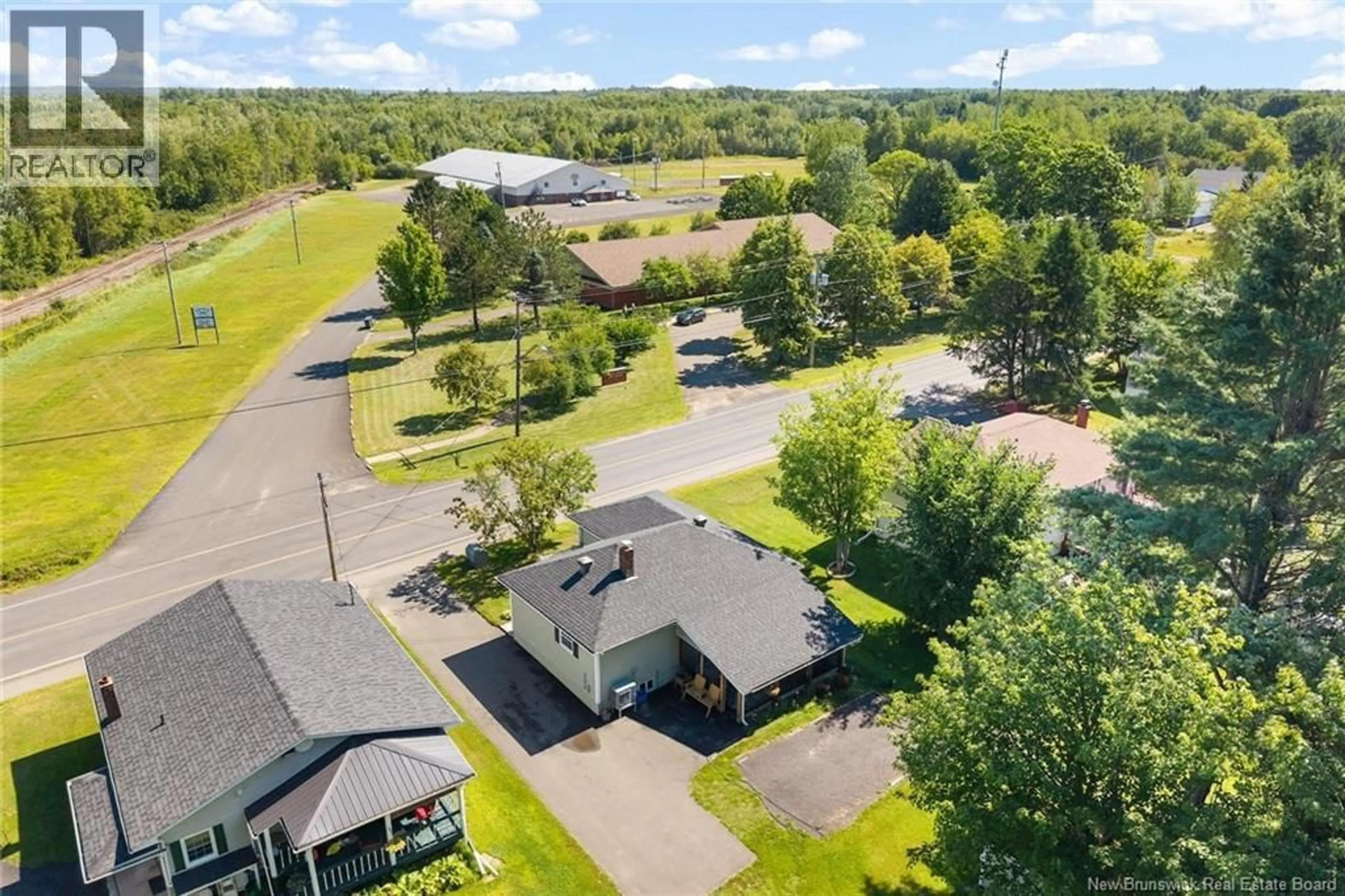 A pic from outside/outdoor area/front of a property/back of a property/a pic from drone, unknown for 90 KING STREET, Chipman New Brunswick E4A2H7