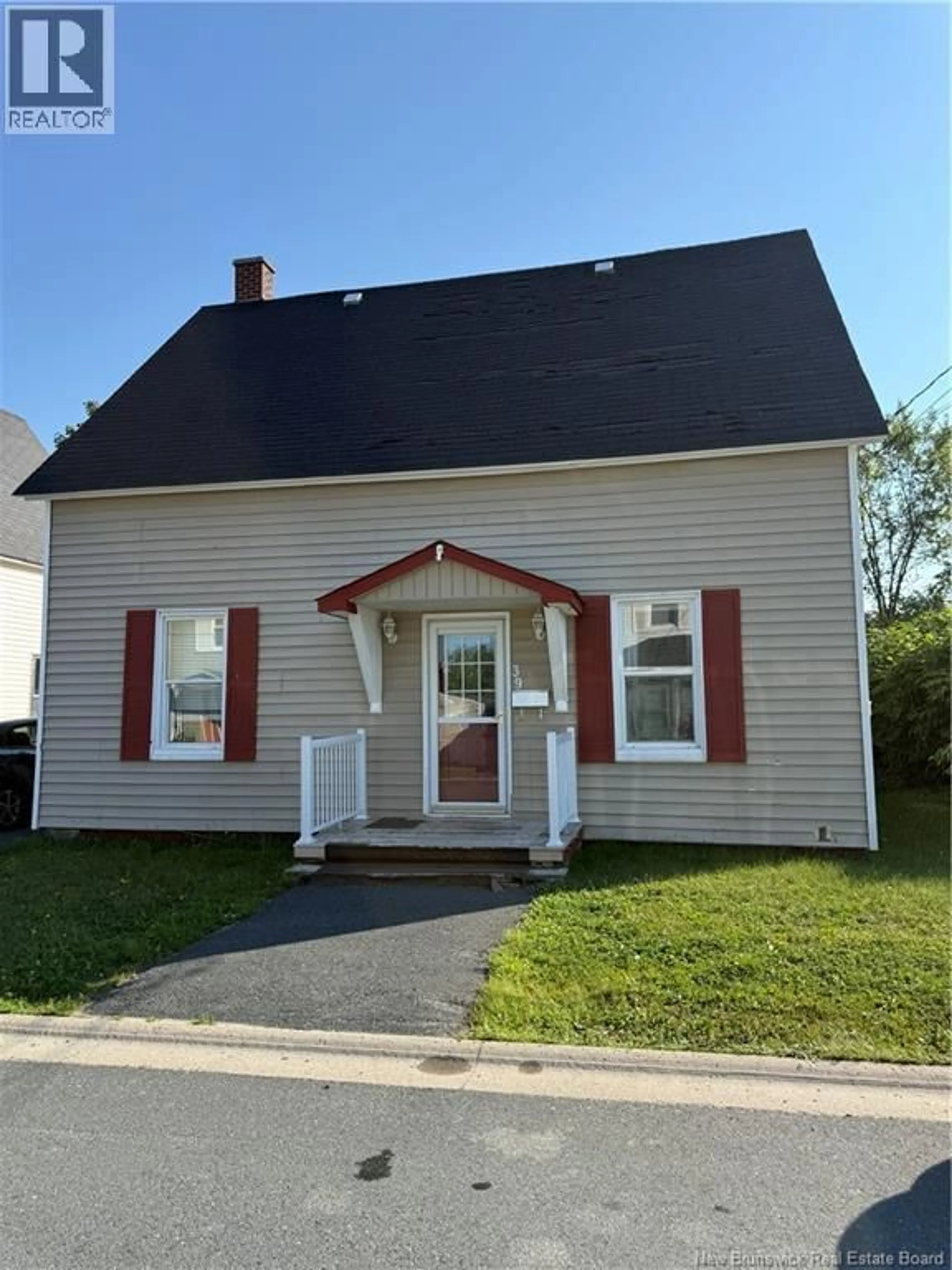 Home with vinyl exterior material, street for 39 WARREN AVENUE, Miramichi New Brunswick E1N2J6