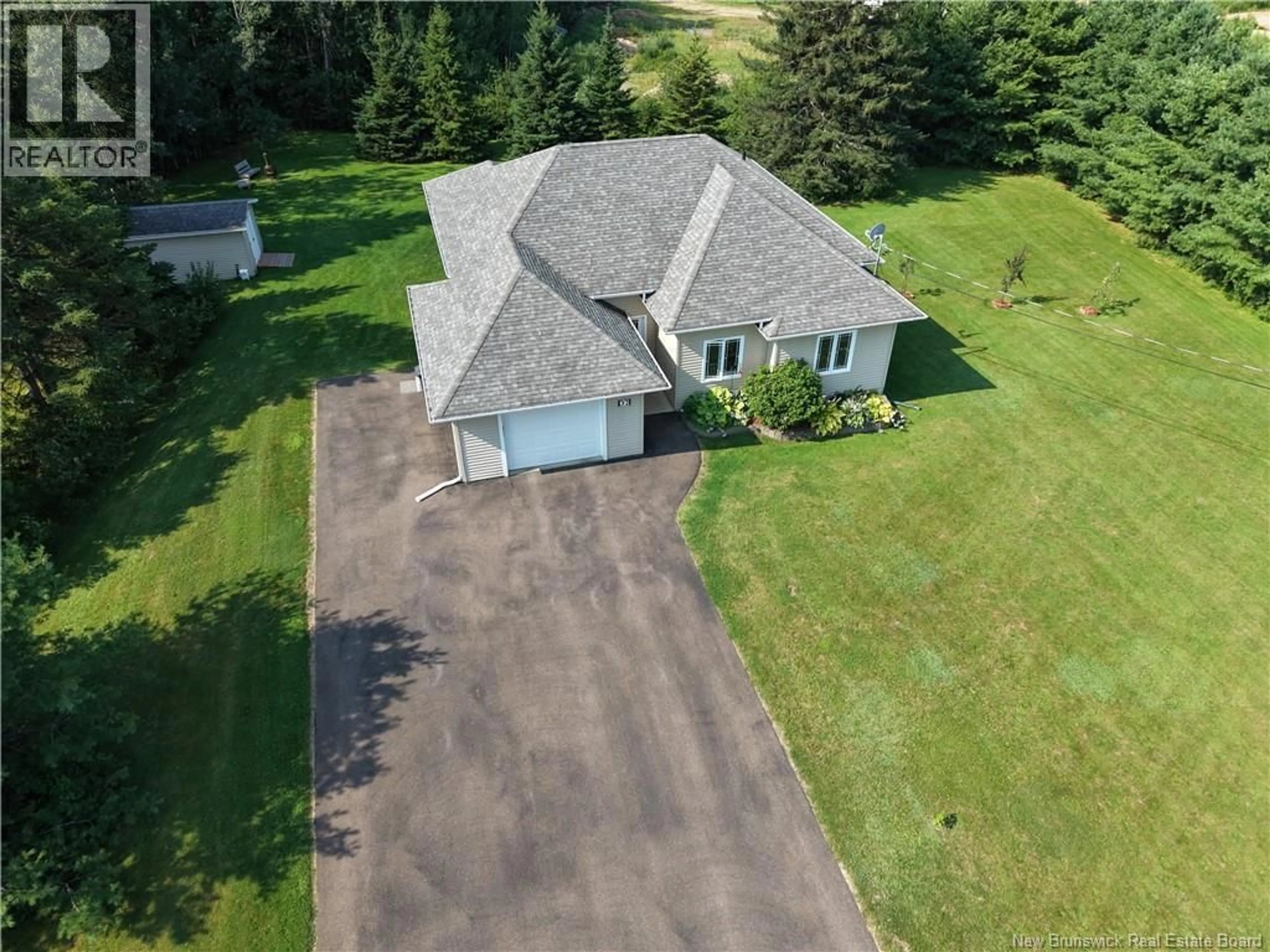 A pic from outside/outdoor area/front of a property/back of a property/a pic from drone, street for 32 MURRAY ROAD, Saint-Antoine New Brunswick E4V1A2
