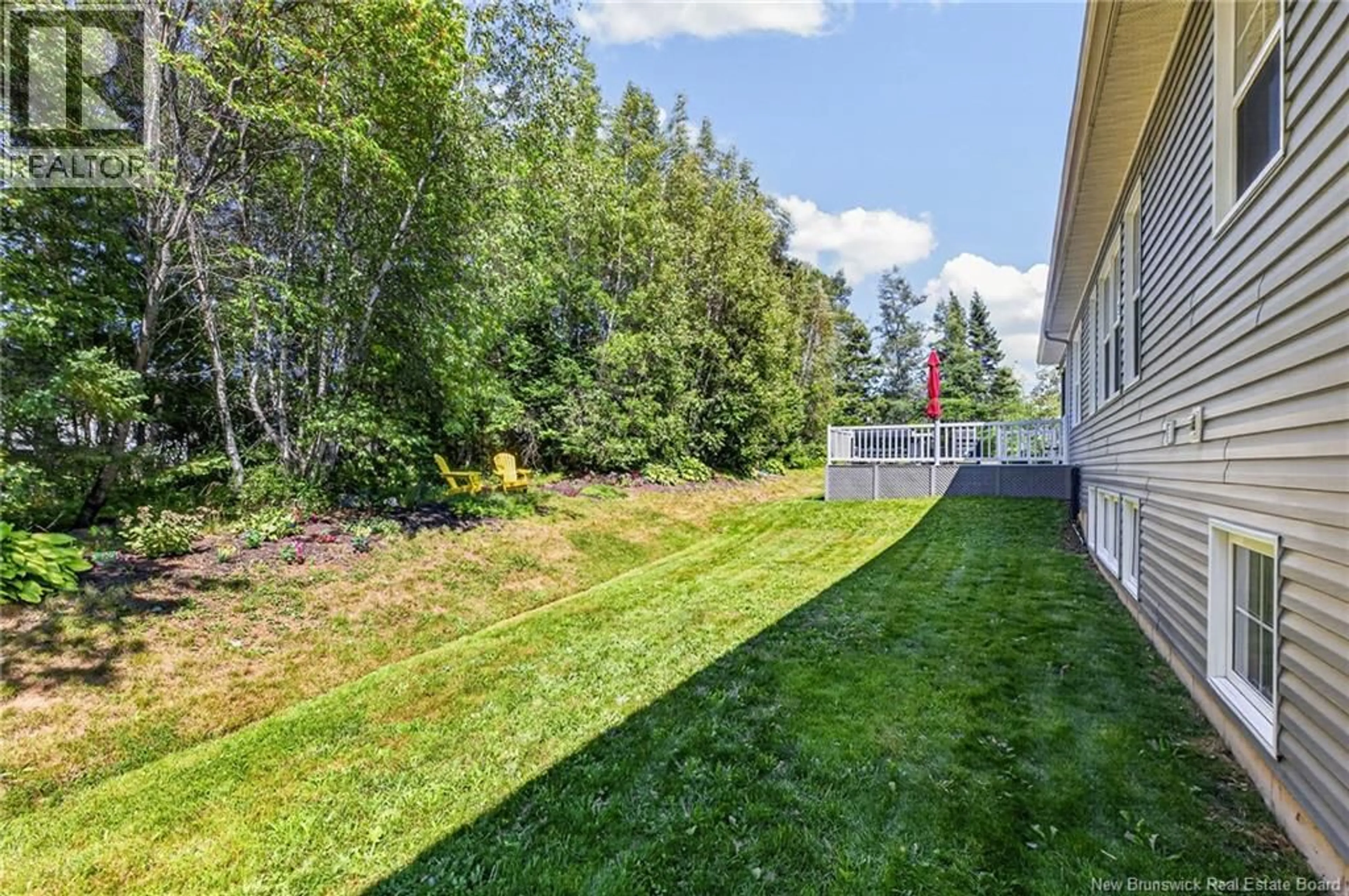 Patio, forest/trees view for 22 DAVID COURT, Dieppe New Brunswick E1A0J7