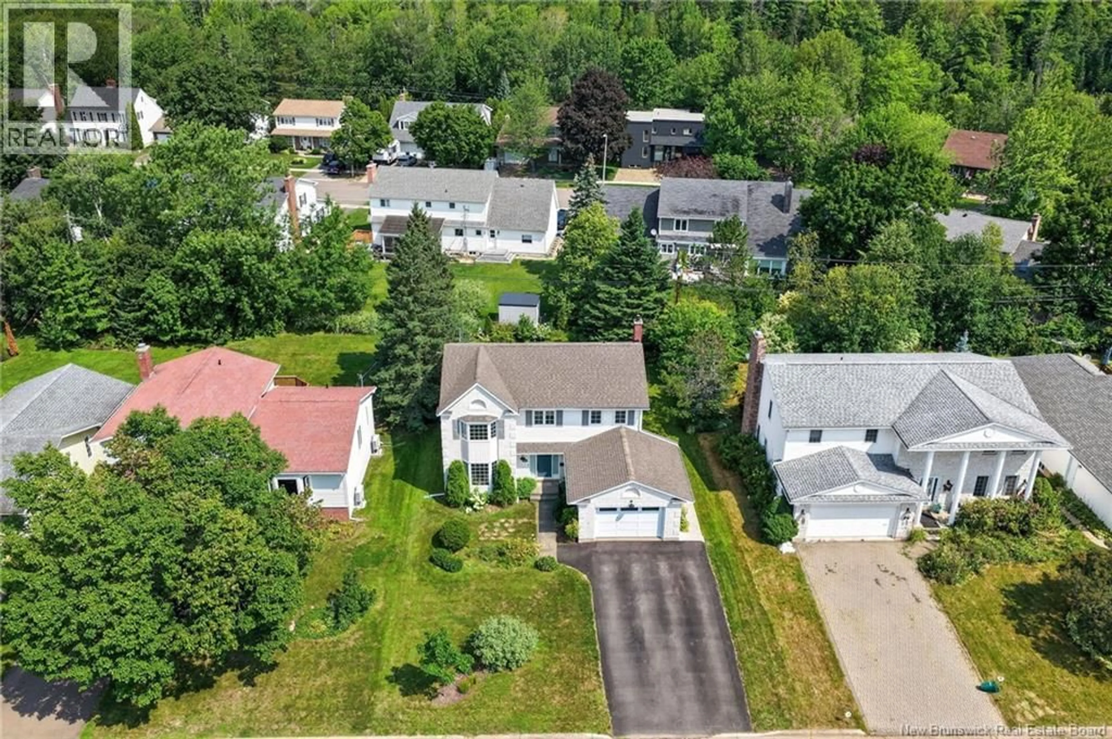 A pic from outside/outdoor area/front of a property/back of a property/a pic from drone, street for 23 GLENDALE CRESCENT, Moncton New Brunswick E1E3Z8