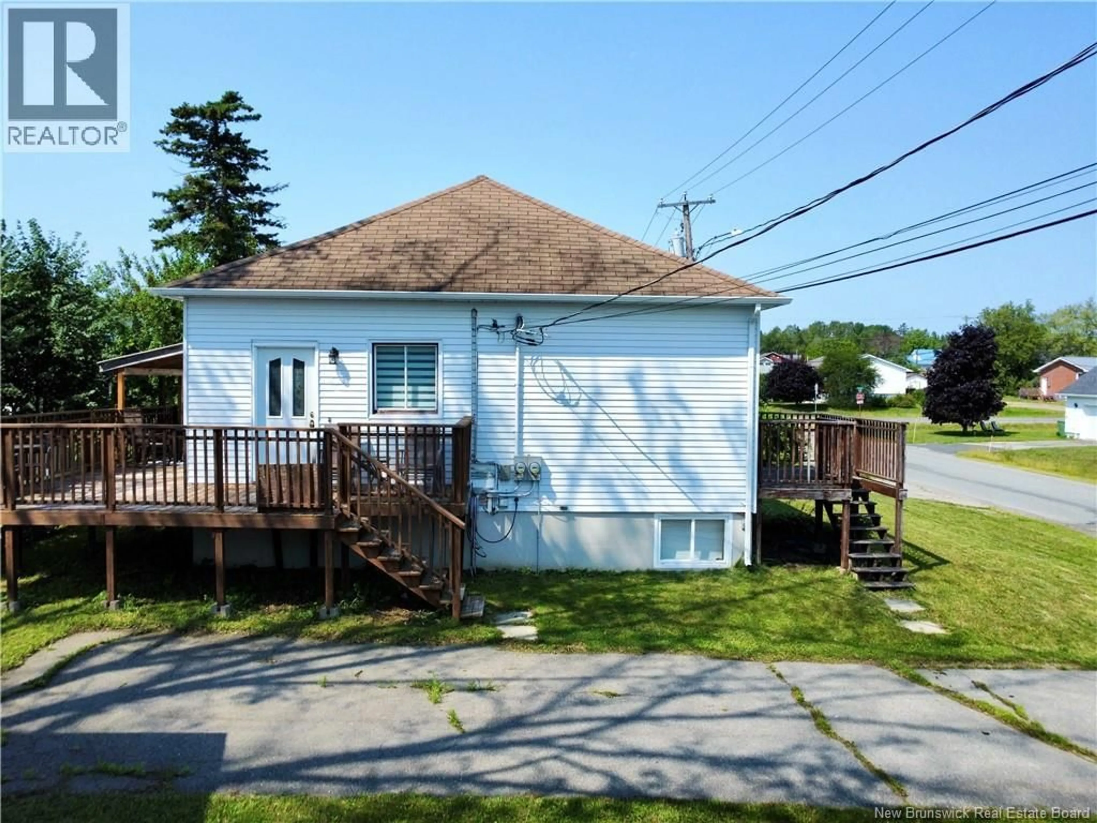 A pic from outside/outdoor area/front of a property/back of a property/a pic from drone, street for 565 ST SIMON, Bathurst New Brunswick E2A3L7