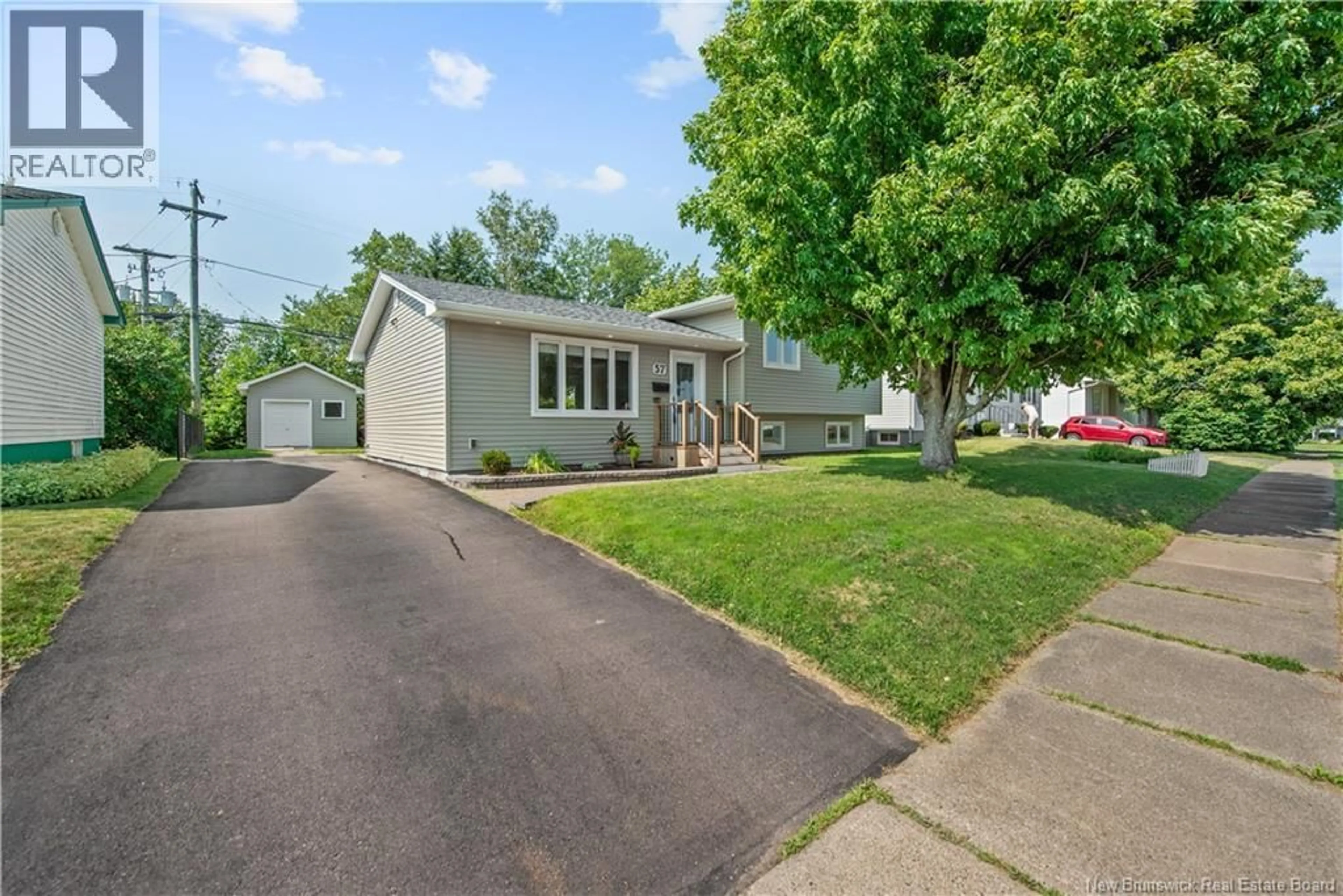Home with vinyl exterior material, street for 57 UPLAND ROAD, Moncton New Brunswick E1G1K4