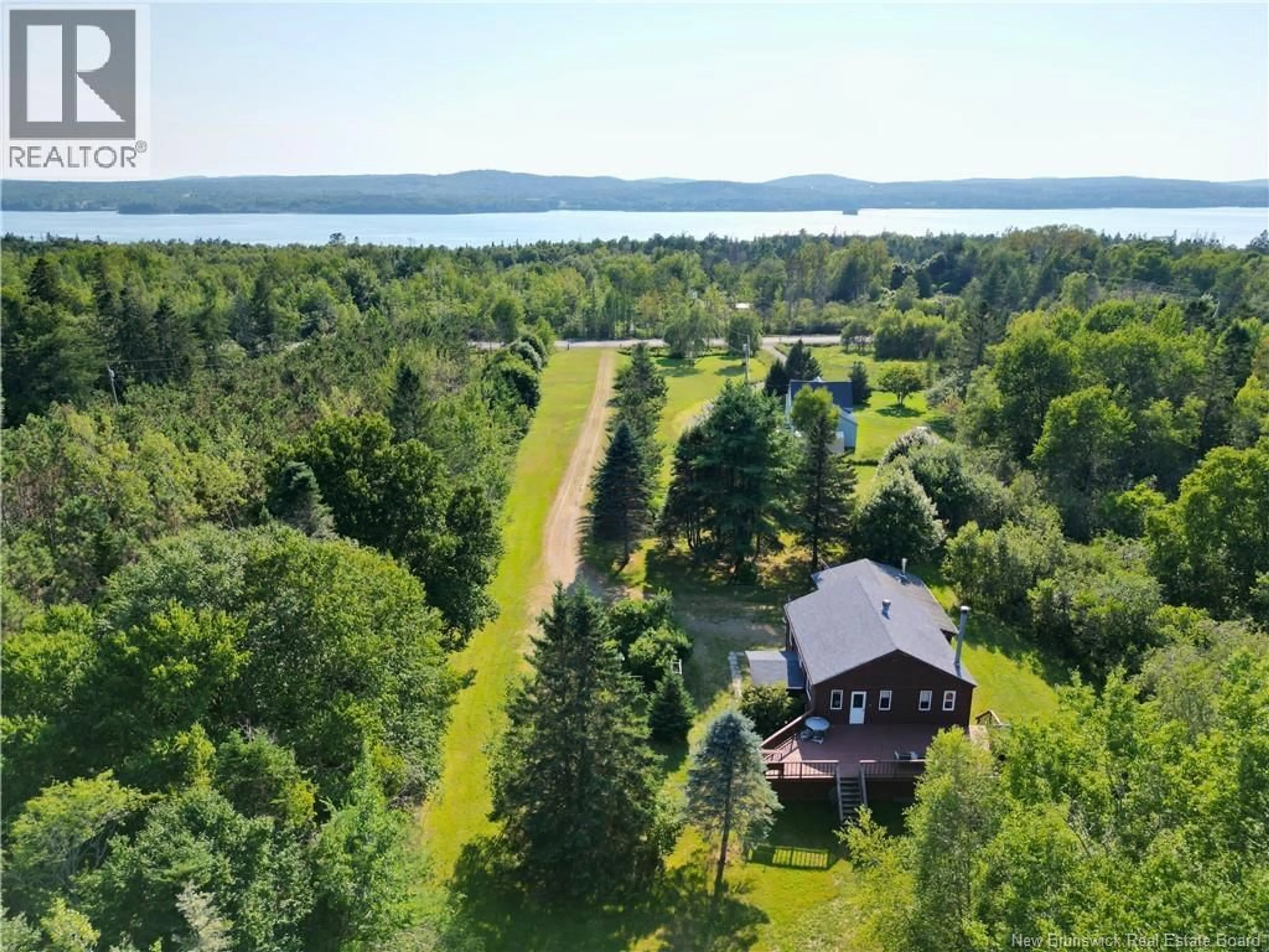 A pic from outside/outdoor area/front of a property/back of a property/a pic from drone, water/lake/river/ocean view for 3709 ROUTE 127, Bayside New Brunswick E5B2T1