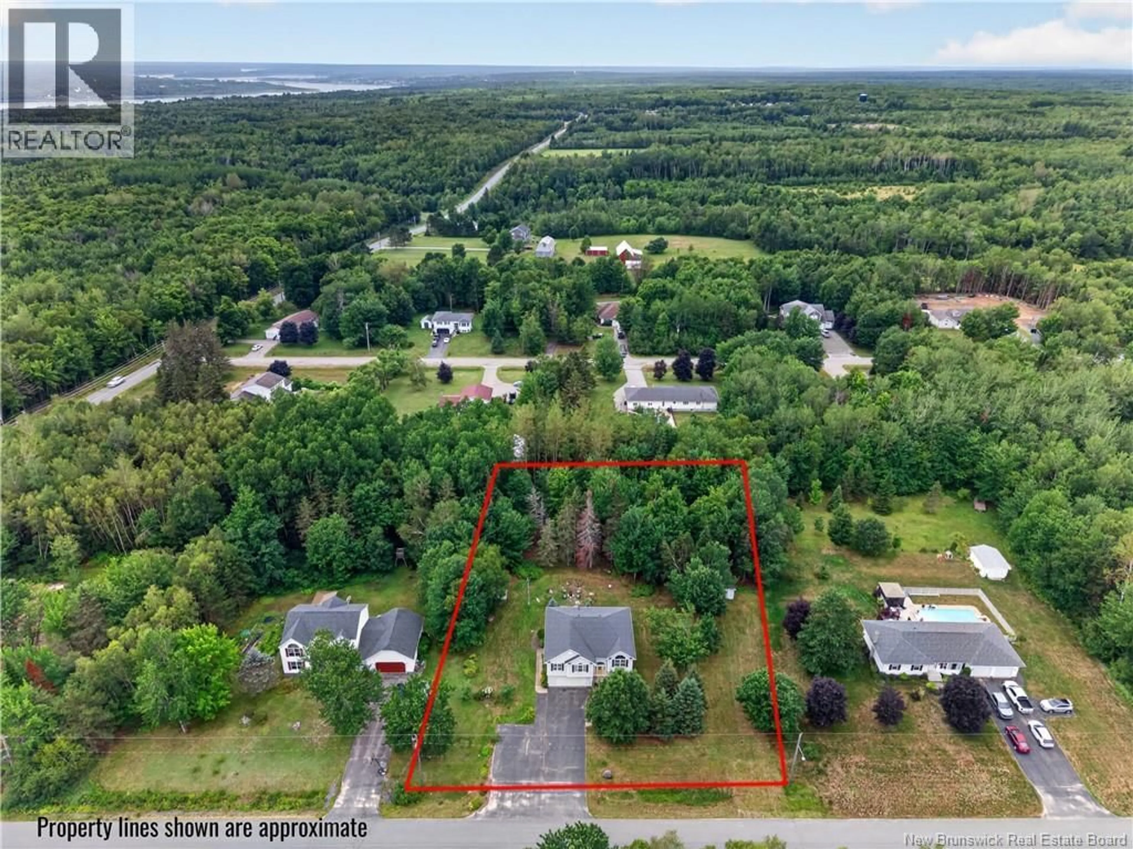 A pic from outside/outdoor area/front of a property/back of a property/a pic from drone, forest/trees view for 33 AMY STREET, Miramichi New Brunswick E1V5Z2
