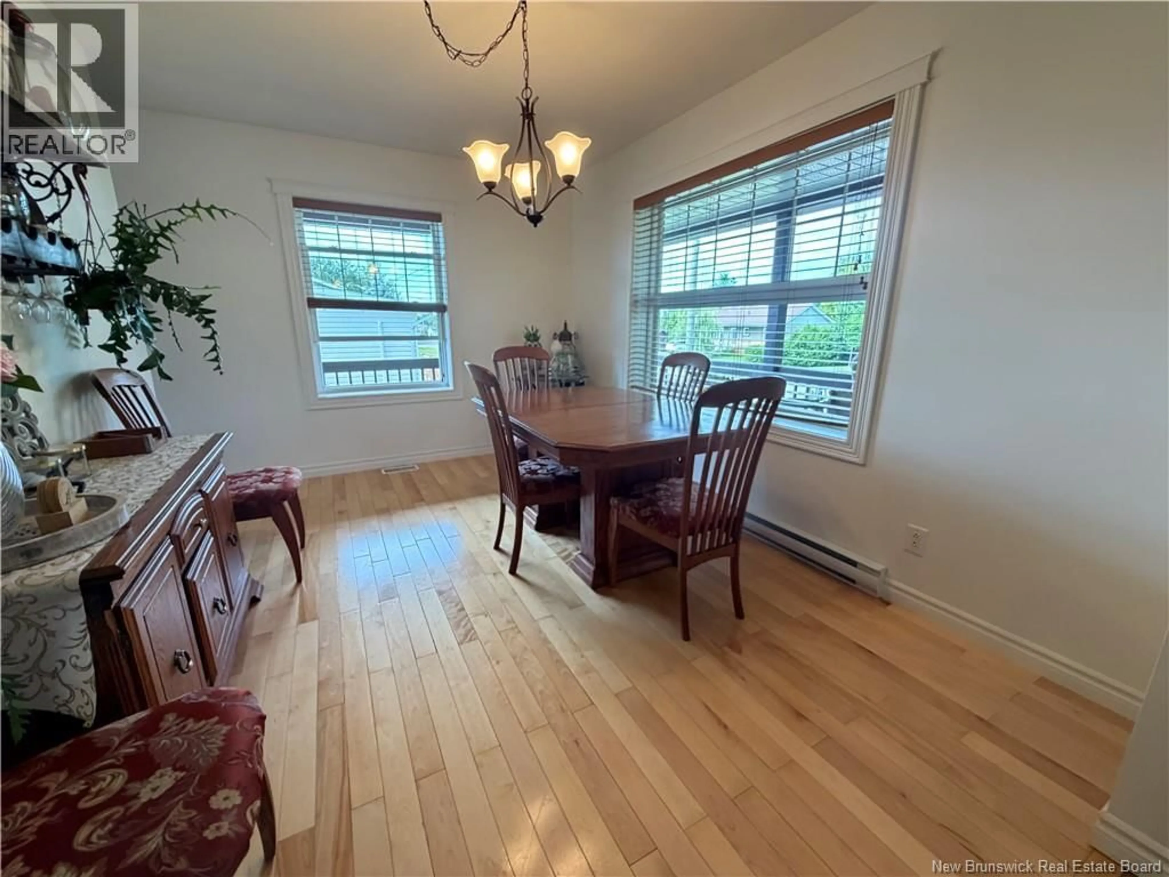 Dining room, wood/laminate floor for 50 RUE VALCOURT RUE, Saint-Quentin New Brunswick E8A2B3