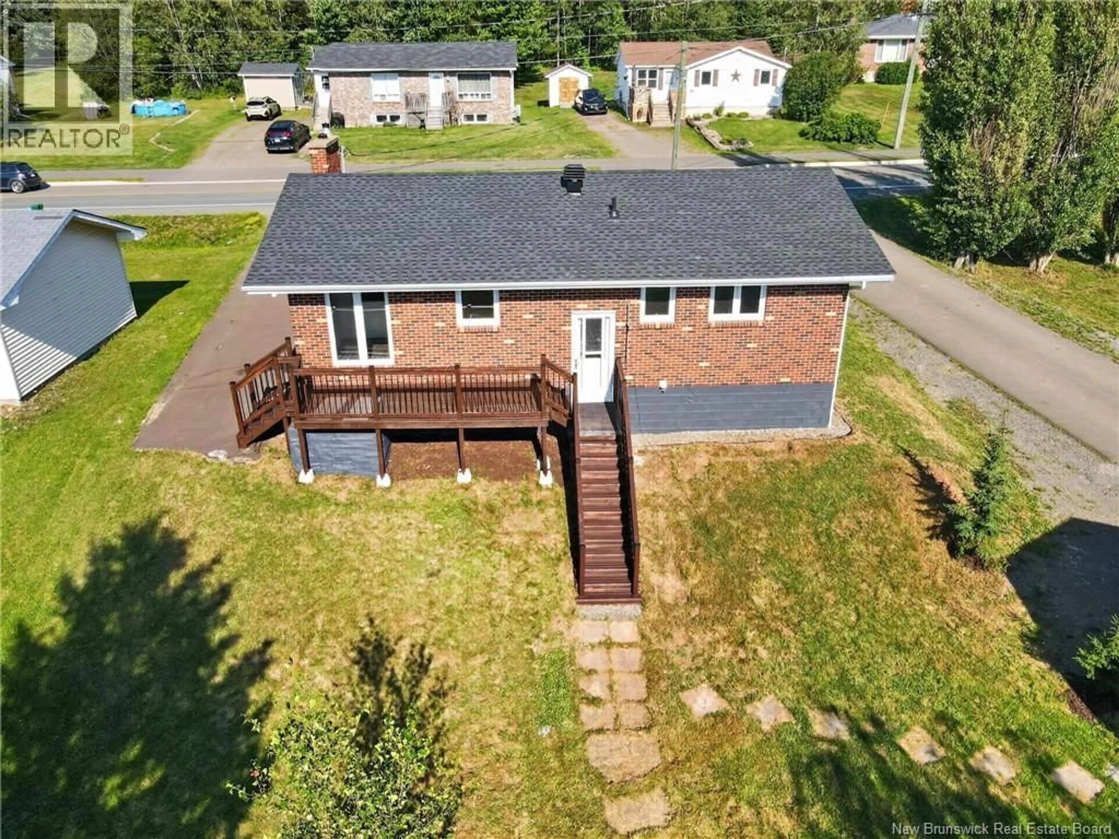 A pic from outside/outdoor area/front of a property/back of a property/a pic from drone, street for 407 FOX CREEK ROAD, Dieppe New Brunswick E1A7M5