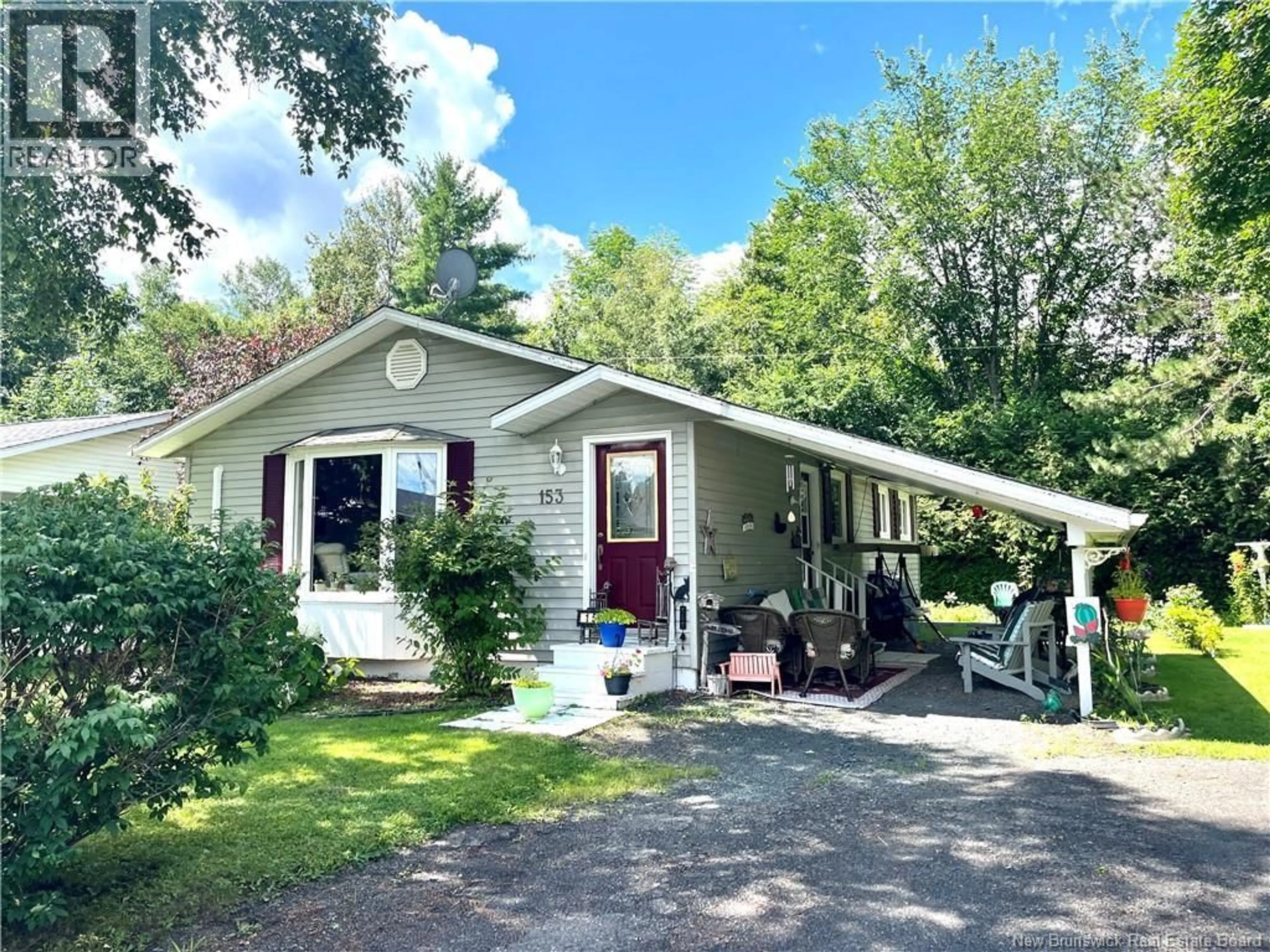 Home with vinyl exterior material, street for 153 HELEN STREET, Woodstock New Brunswick E7M1W7