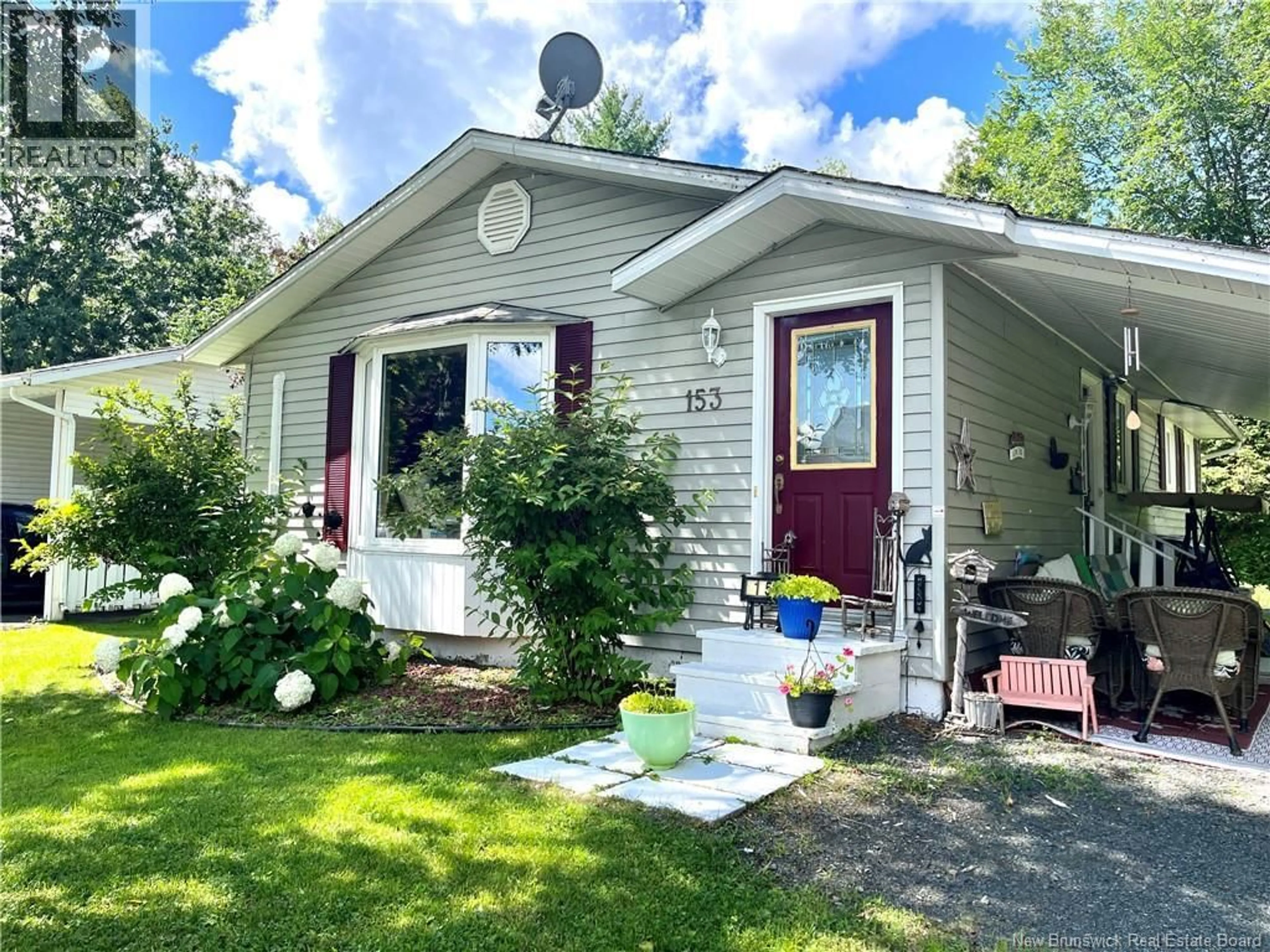 Home with vinyl exterior material, street for 153 HELEN STREET, Woodstock New Brunswick E7M1W7