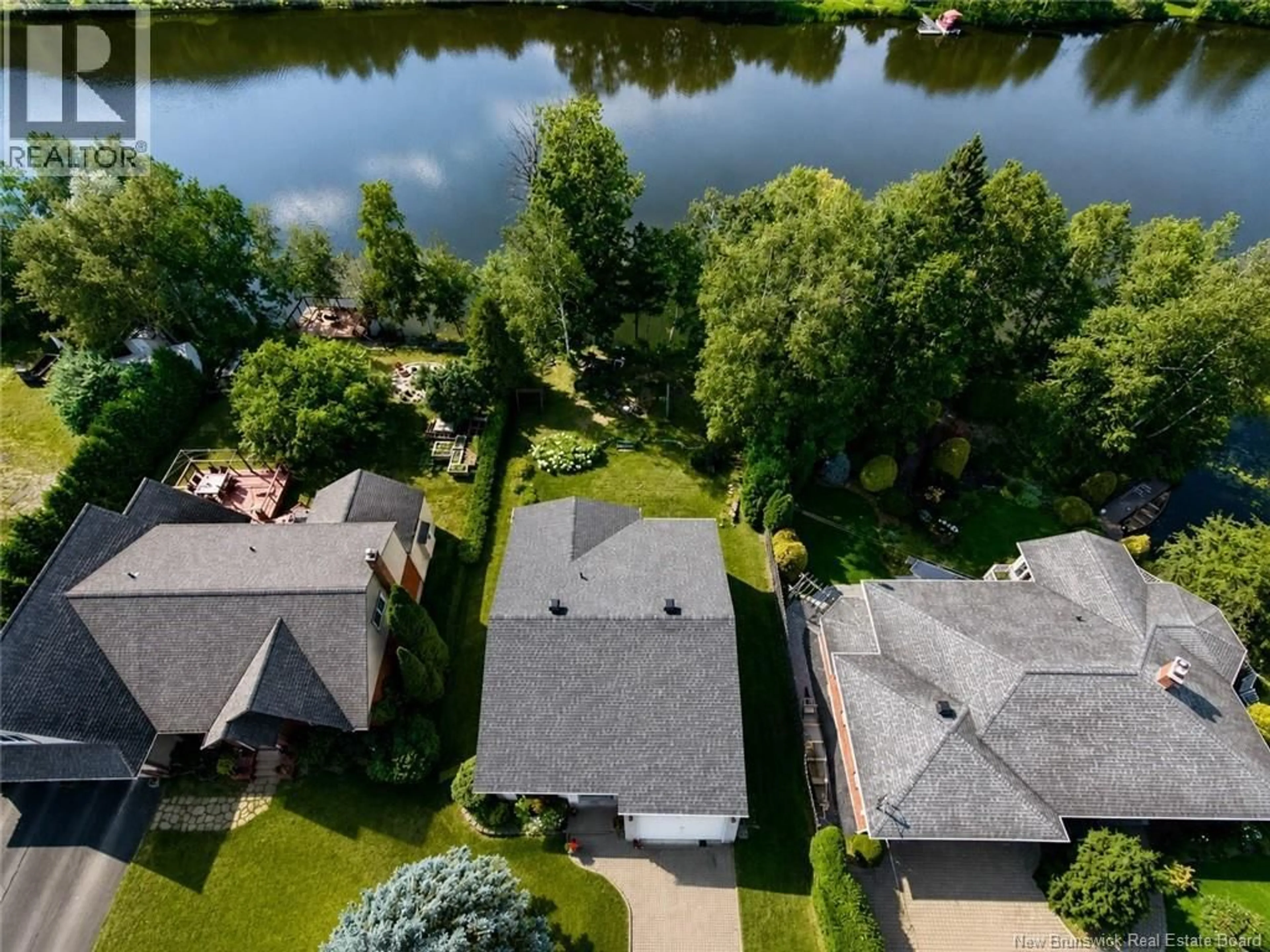A pic from outside/outdoor area/front of a property/back of a property/a pic from drone, water/lake/river/ocean view for 29 LEBLOND STREET, Edmundston New Brunswick E3V4K9