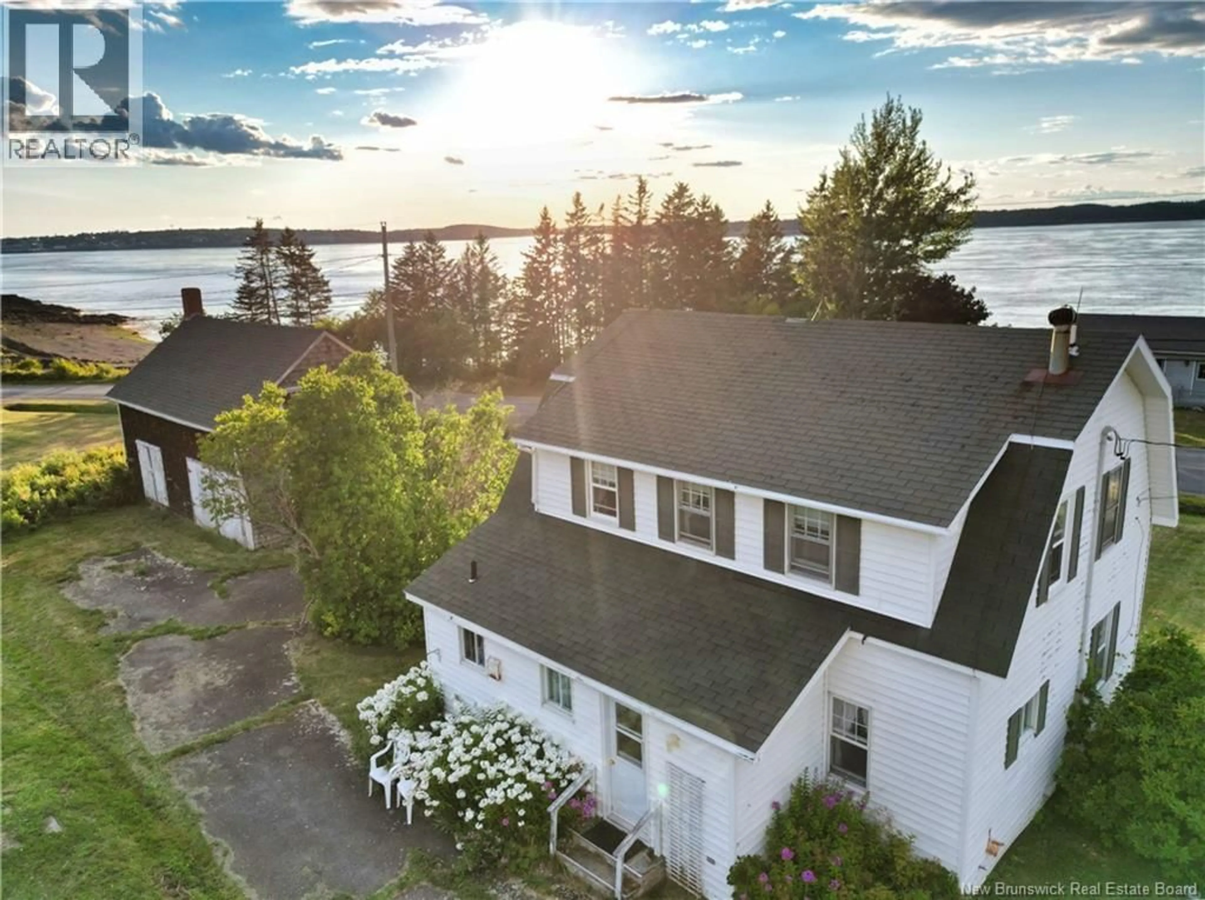 A pic from outside/outdoor area/front of a property/back of a property/a pic from drone, water/lake/river/ocean view for 744 NORTH ROAD, Welshpool New Brunswick E5E1E3