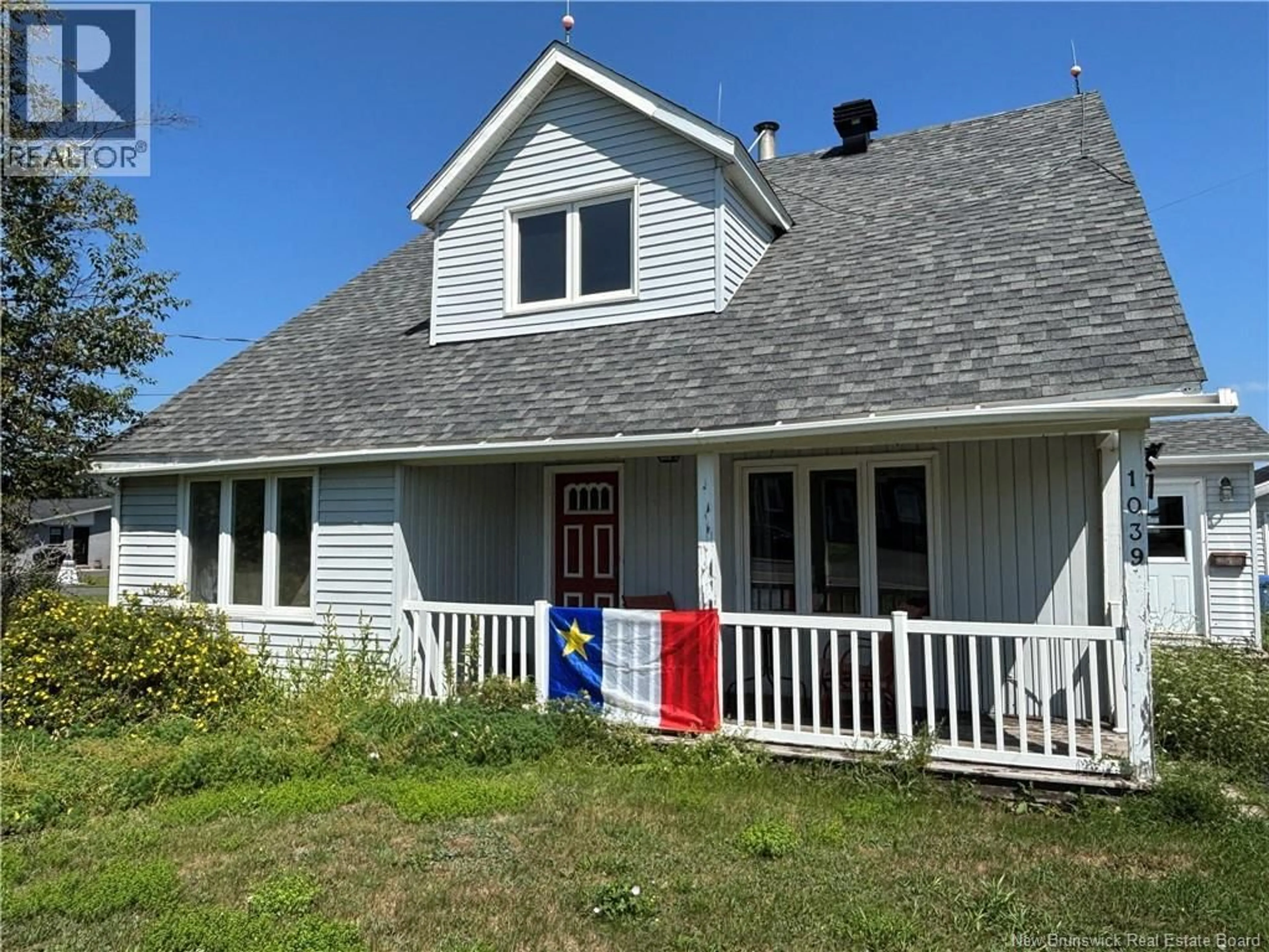 Home with vinyl exterior material, street for 1039 ROUTE 134, Petit-Rocher-Sud New Brunswick E8J1B8