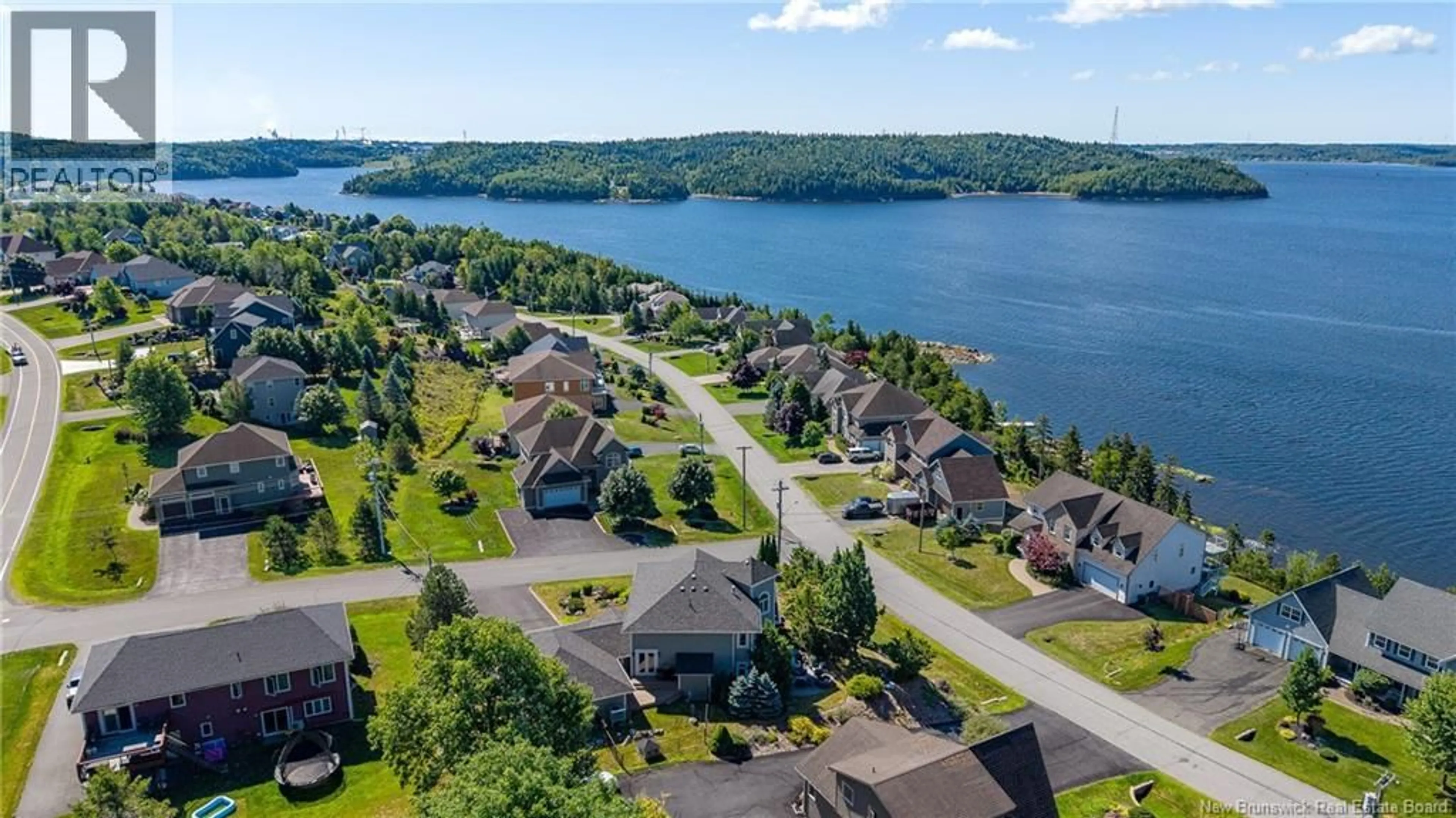 A pic from outside/outdoor area/front of a property/back of a property/a pic from drone, water/lake/river/ocean view for 5 ADMIRALTY DRIVE, Saint John New Brunswick E2K5R4