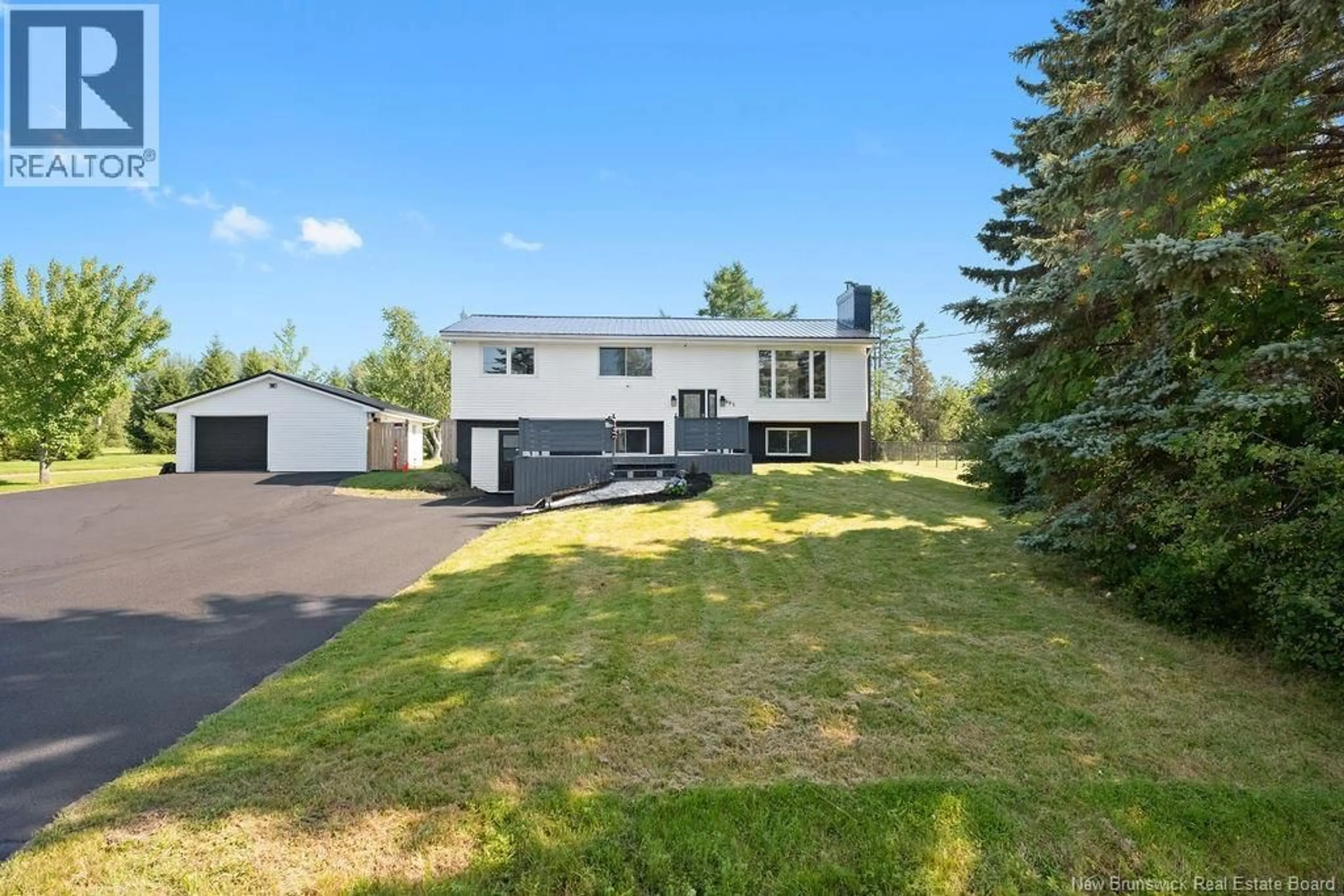 A pic from outside/outdoor area/front of a property/back of a property/a pic from drone, street for 402 MARGUERITE STREET, Dieppe New Brunswick E1A7H1
