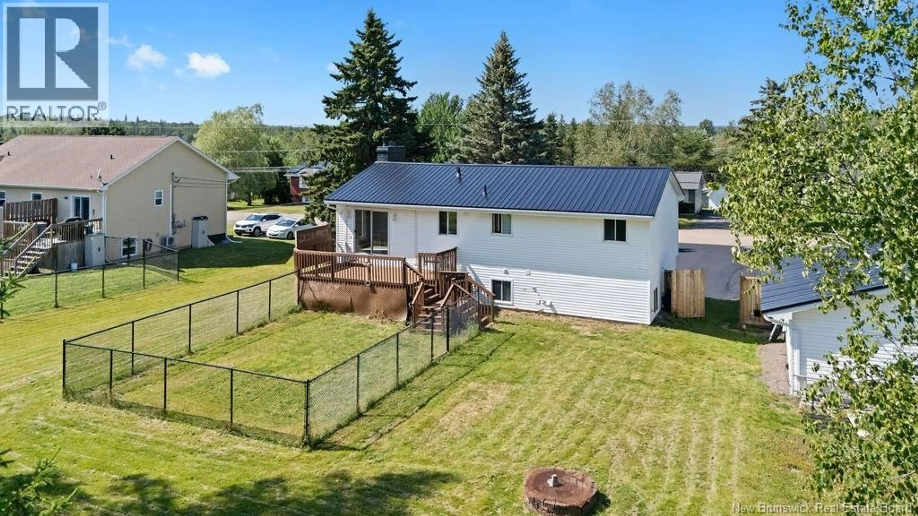 A pic from outside/outdoor area/front of a property/back of a property/a pic from drone, unknown for 402 MARGUERITE STREET, Dieppe New Brunswick E1A7H1