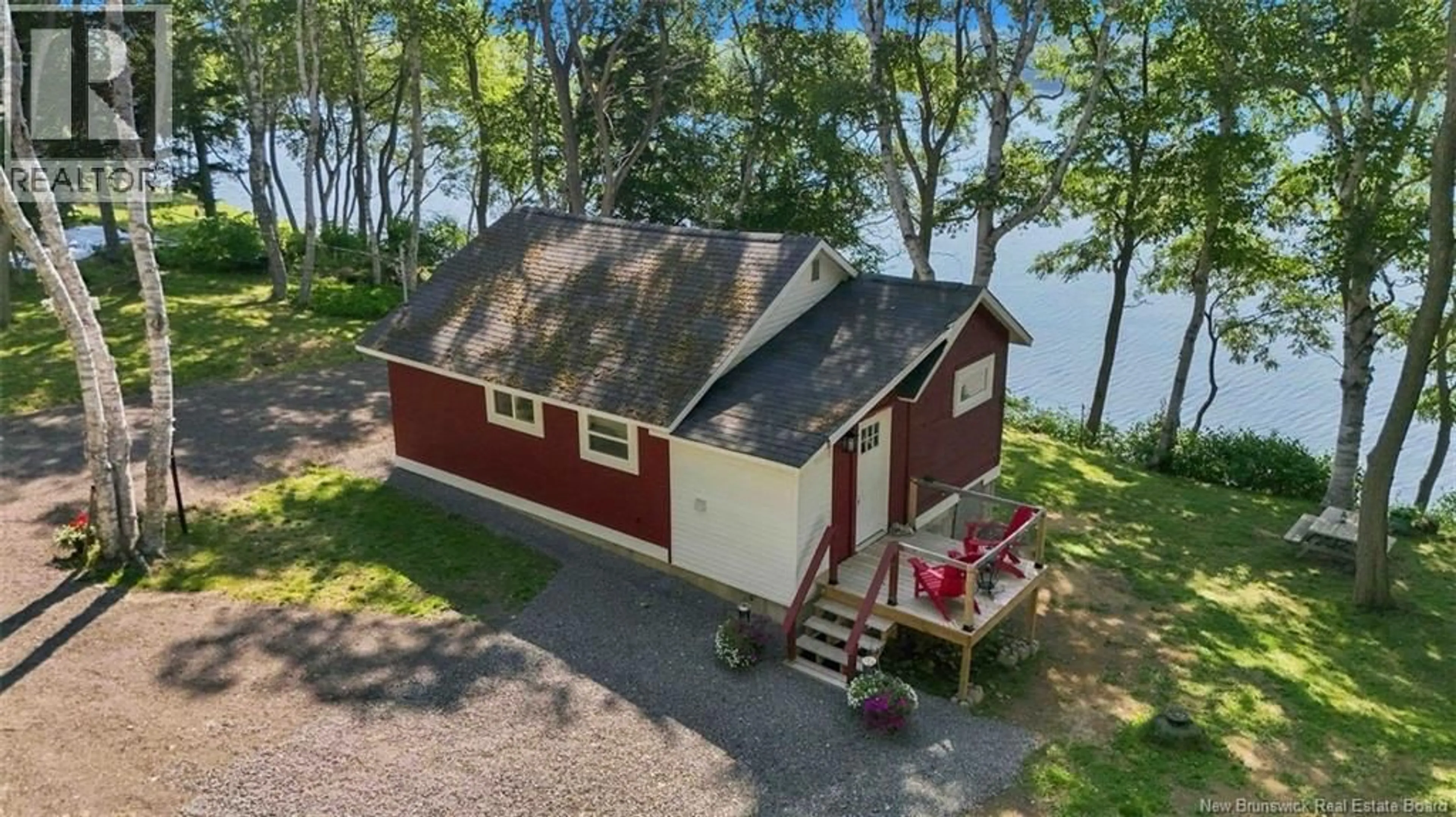 A pic from outside/outdoor area/front of a property/back of a property/a pic from drone, water/lake/river/ocean view for 40 COUNTRY LANE, McKees Mills New Brunswick E4V2R8