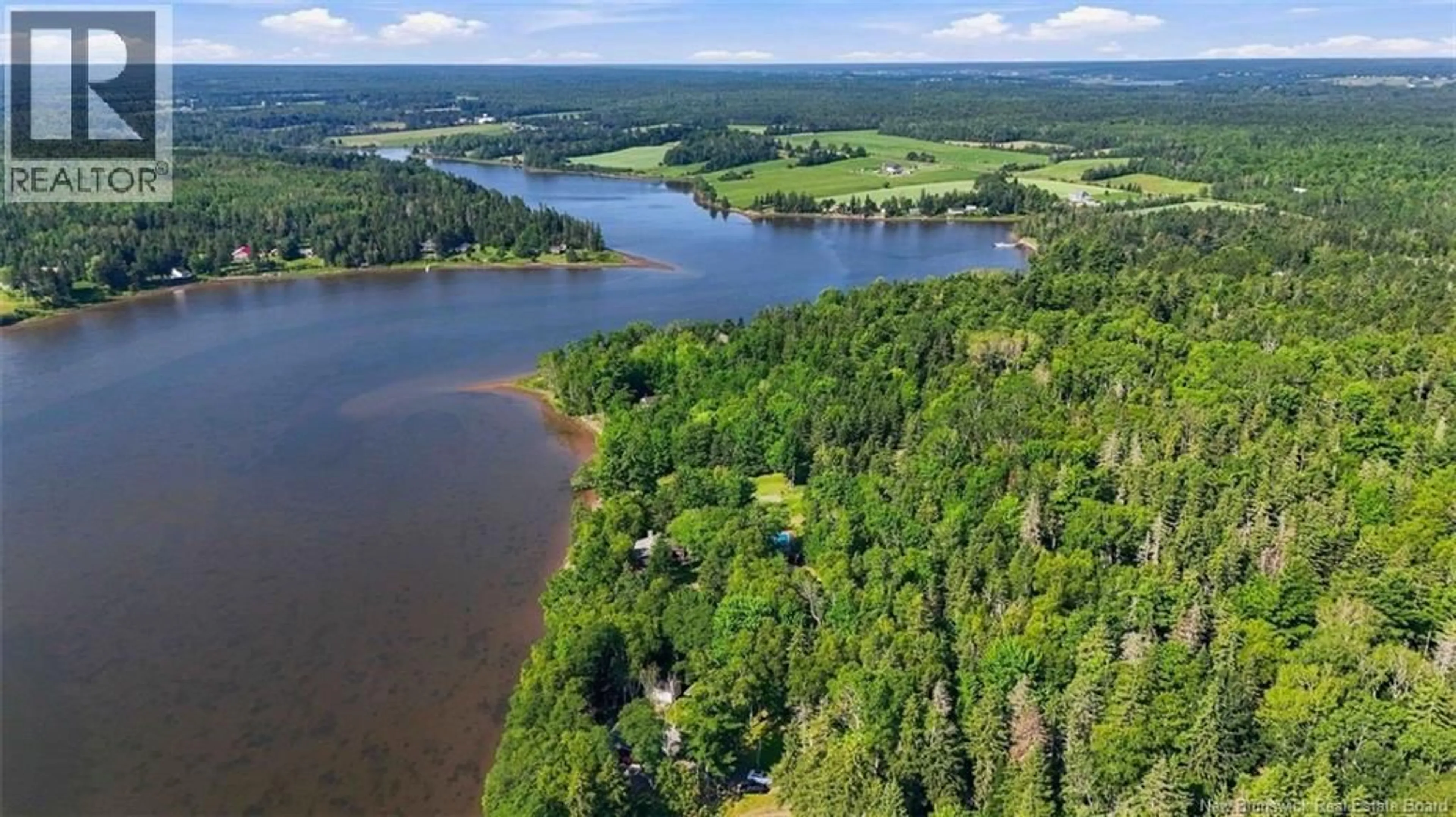 A pic from outside/outdoor area/front of a property/back of a property/a pic from drone, water/lake/river/ocean view for 40 COUNTRY LANE, McKees Mills New Brunswick E4V2R8