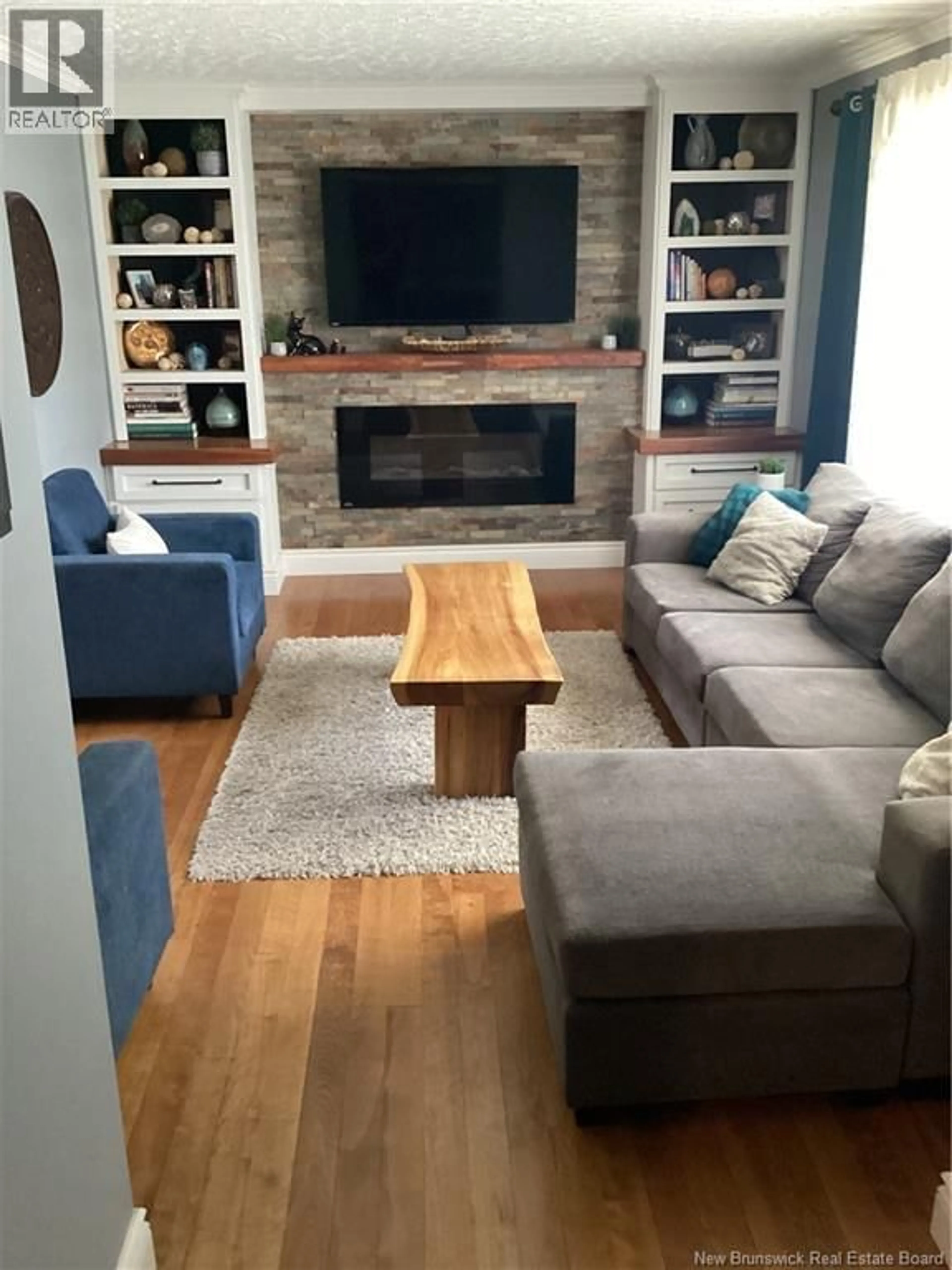 Living room with furniture, wood/laminate floor for 237 BUCKINGHAM AVENUE, Riverview New Brunswick E1B2N9