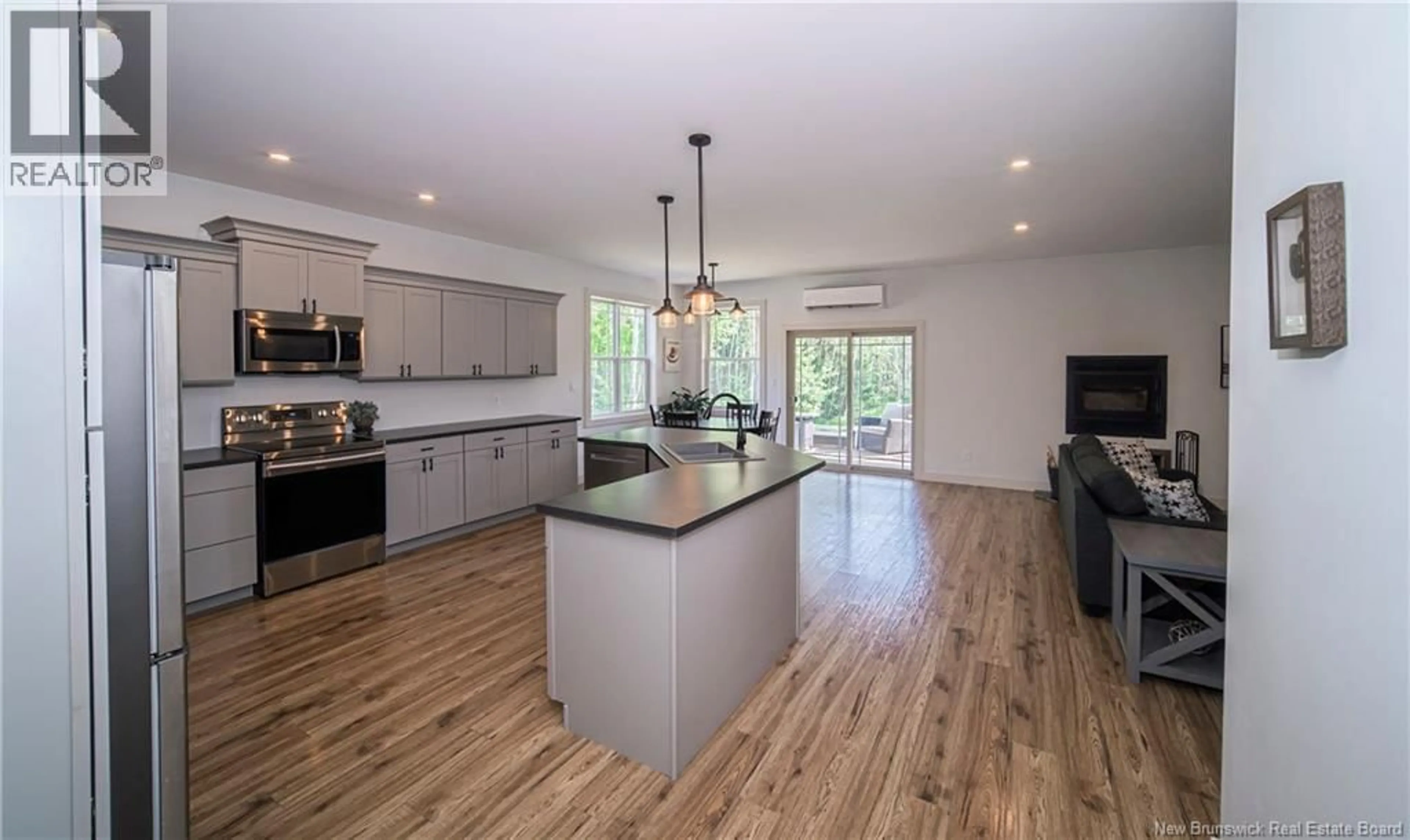 Open concept kitchen, wood/laminate floor for 335 RUSAGONIS ROAD, Rusagonis New Brunswick E3B8X2
