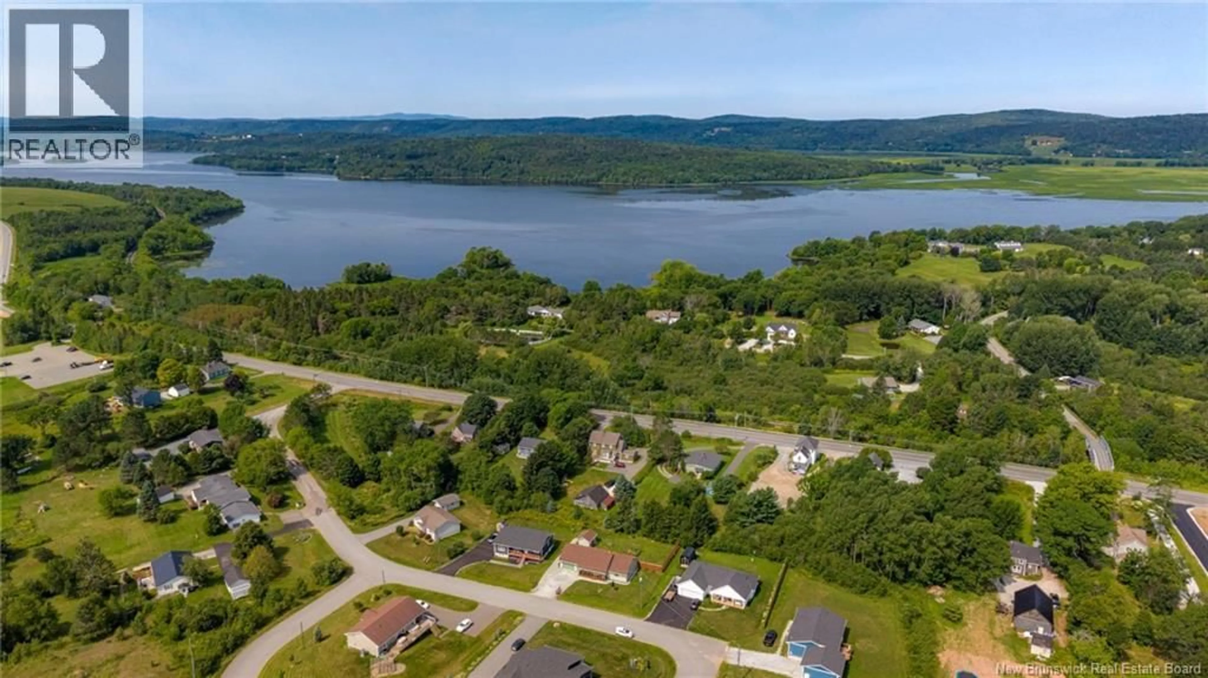 A pic from outside/outdoor area/front of a property/back of a property/a pic from drone, water/lake/river/ocean view for 33 NEILL DRIVE, Hampton New Brunswick E5N6B8