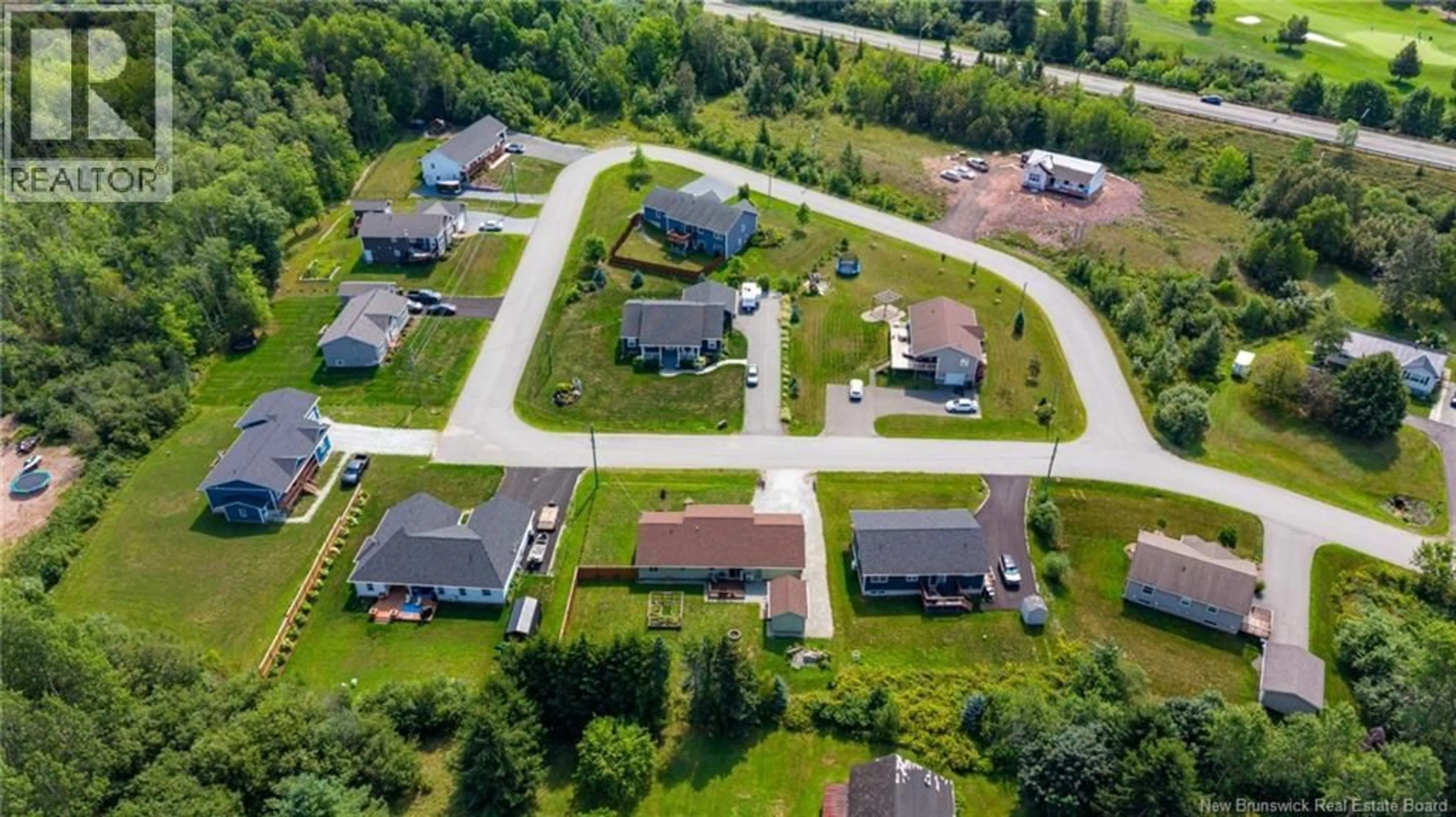 A pic from outside/outdoor area/front of a property/back of a property/a pic from drone, street for 33 NEILL DRIVE, Hampton New Brunswick E5N6B8