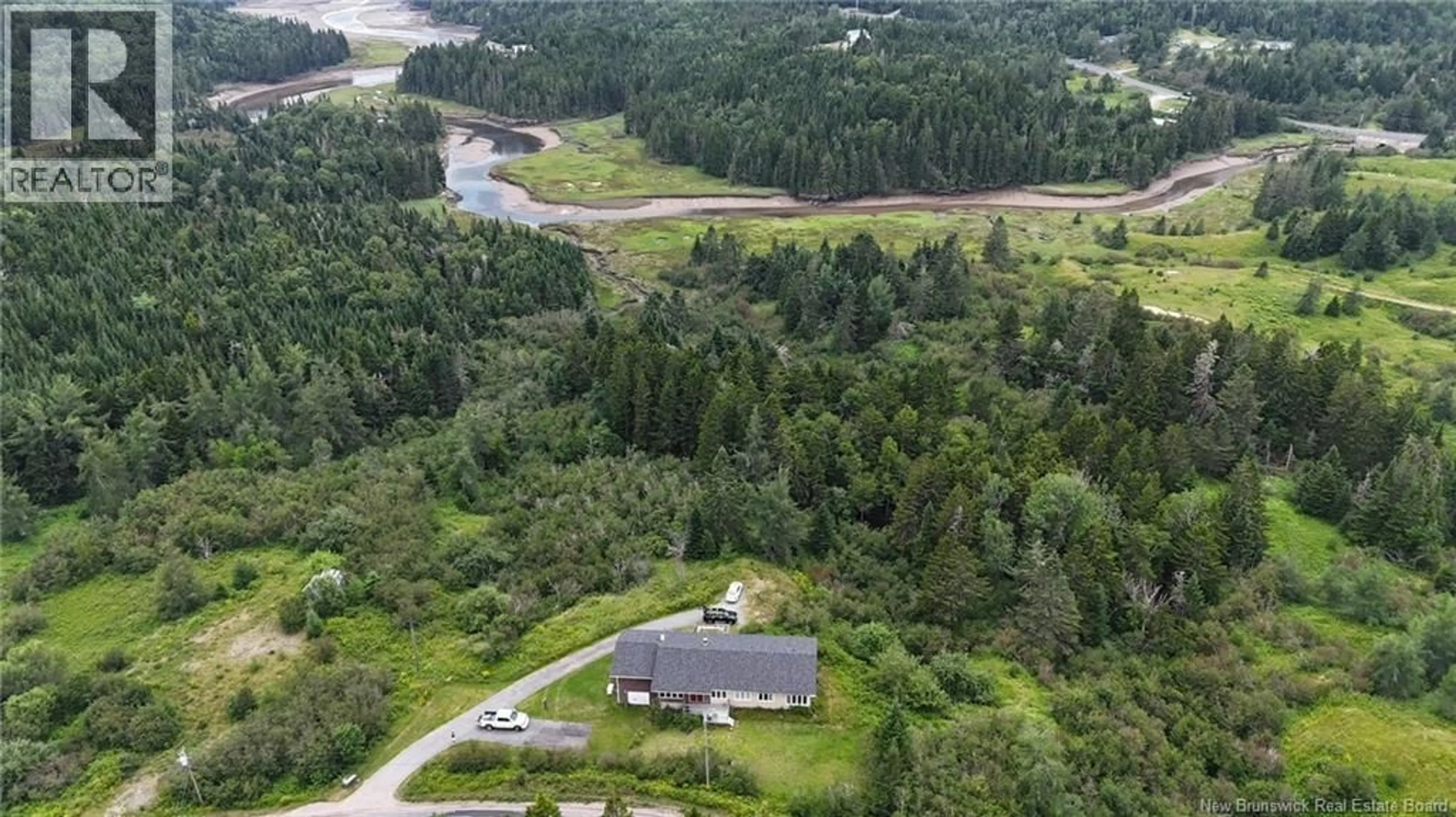 A pic from outside/outdoor area/front of a property/back of a property/a pic from drone, water/lake/river/ocean view for 68 MUNROE ROAD, Pennfield New Brunswick E5H2A8