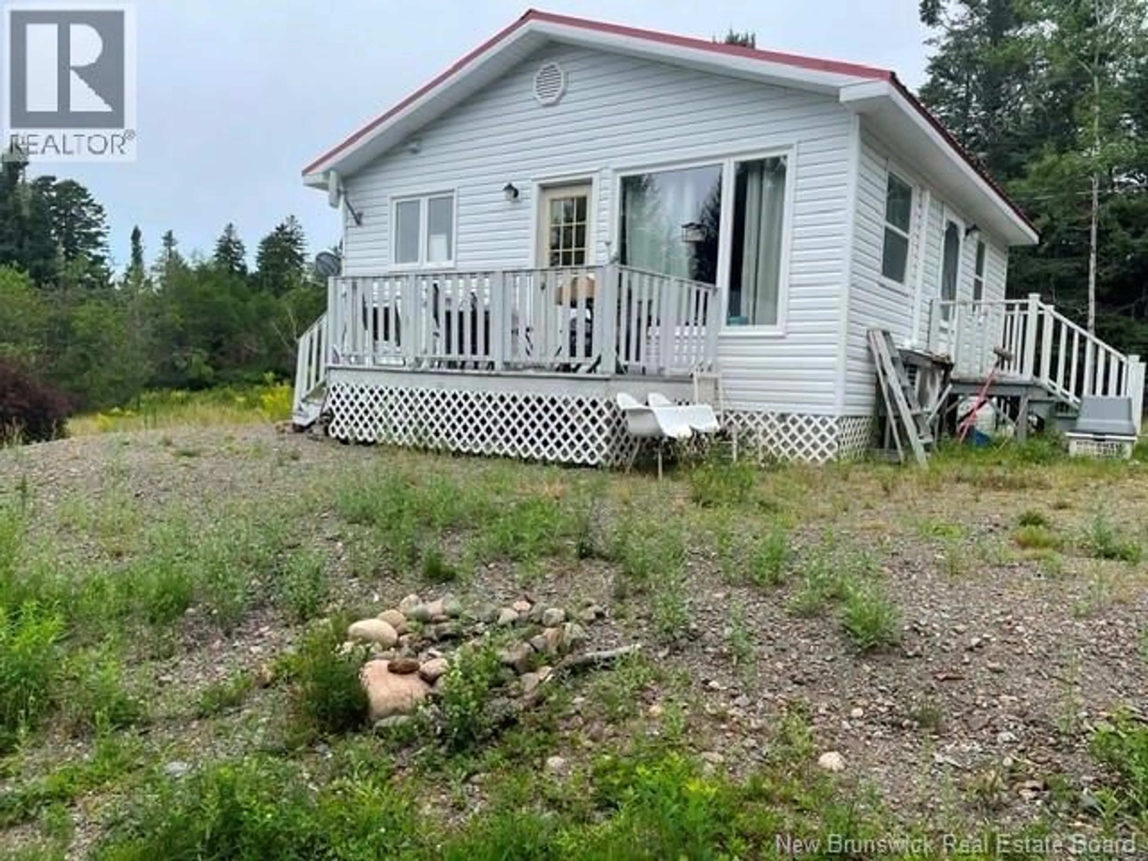 A pic from outside/outdoor area/front of a property/back of a property/a pic from drone, unknown for 150 ROUTE 778, Pennfield New Brunswick E5H2B6