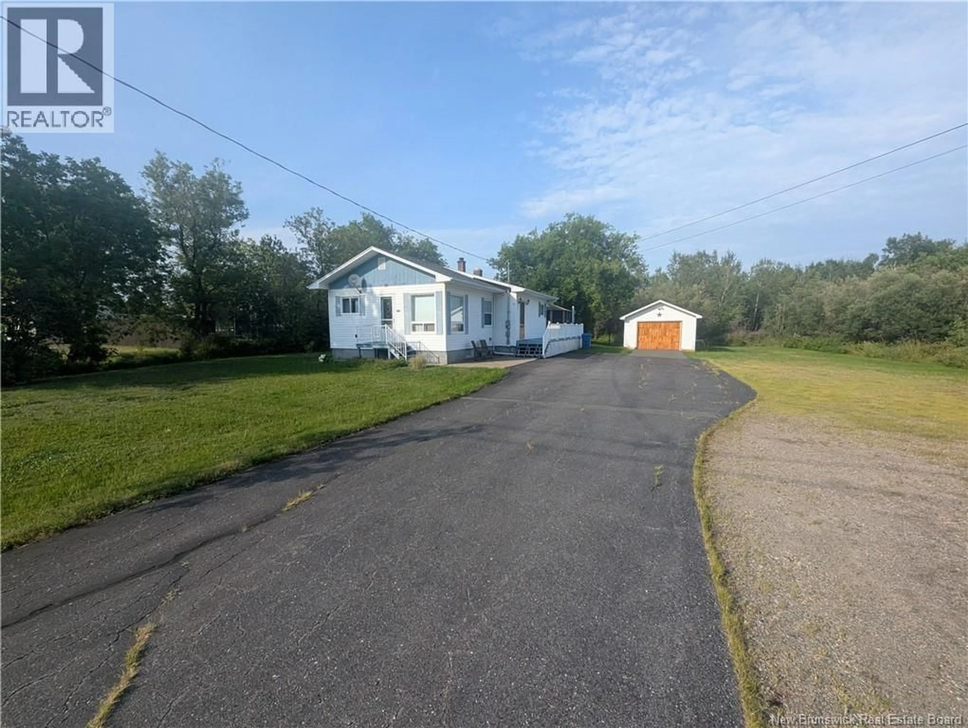 A pic from outside/outdoor area/front of a property/back of a property/a pic from drone, street for 2625 MIRAMICHI, Bathurst New Brunswick E2A6K1