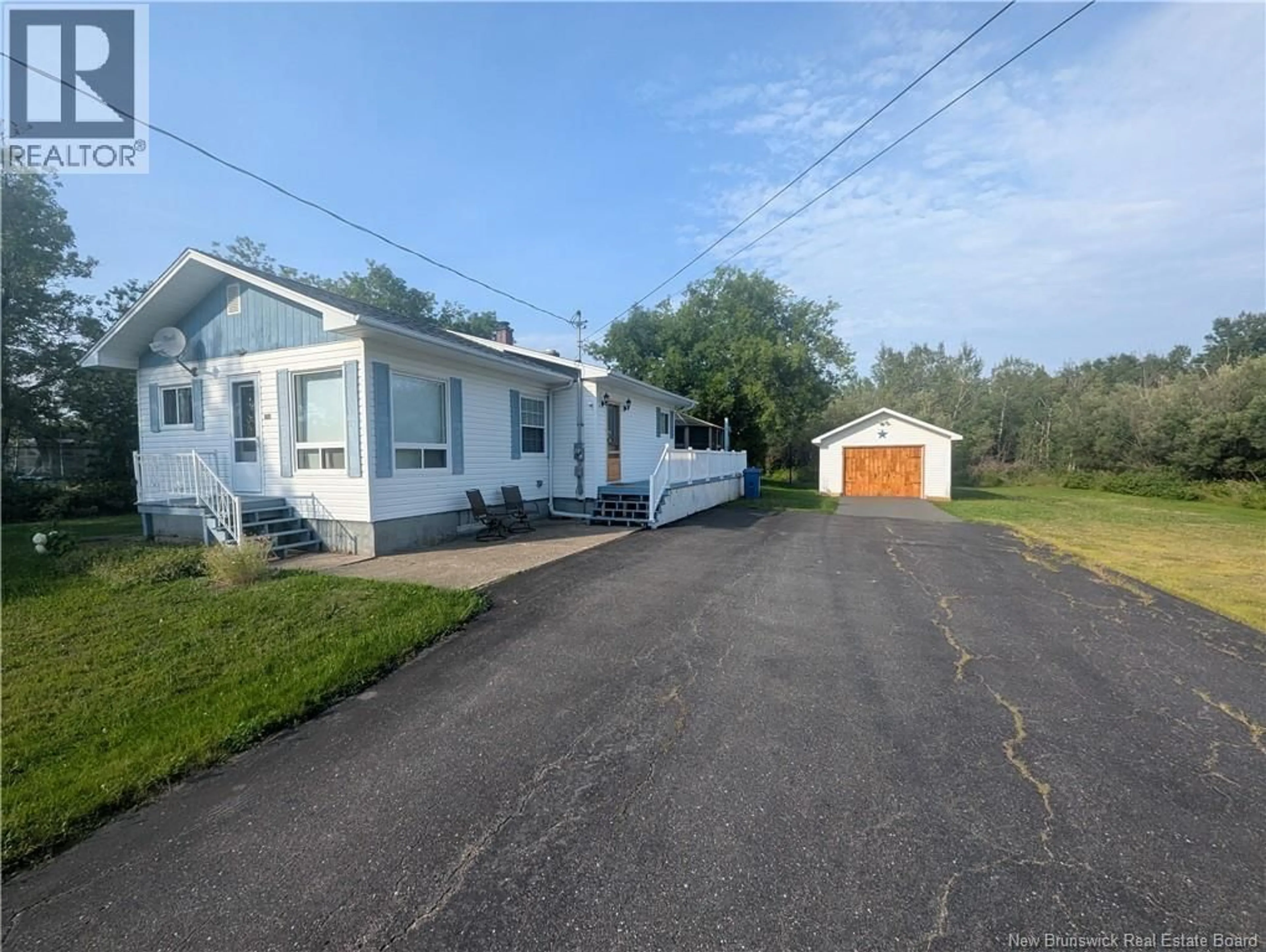 A pic from outside/outdoor area/front of a property/back of a property/a pic from drone, street for 2625 MIRAMICHI, Bathurst New Brunswick E2A6K1