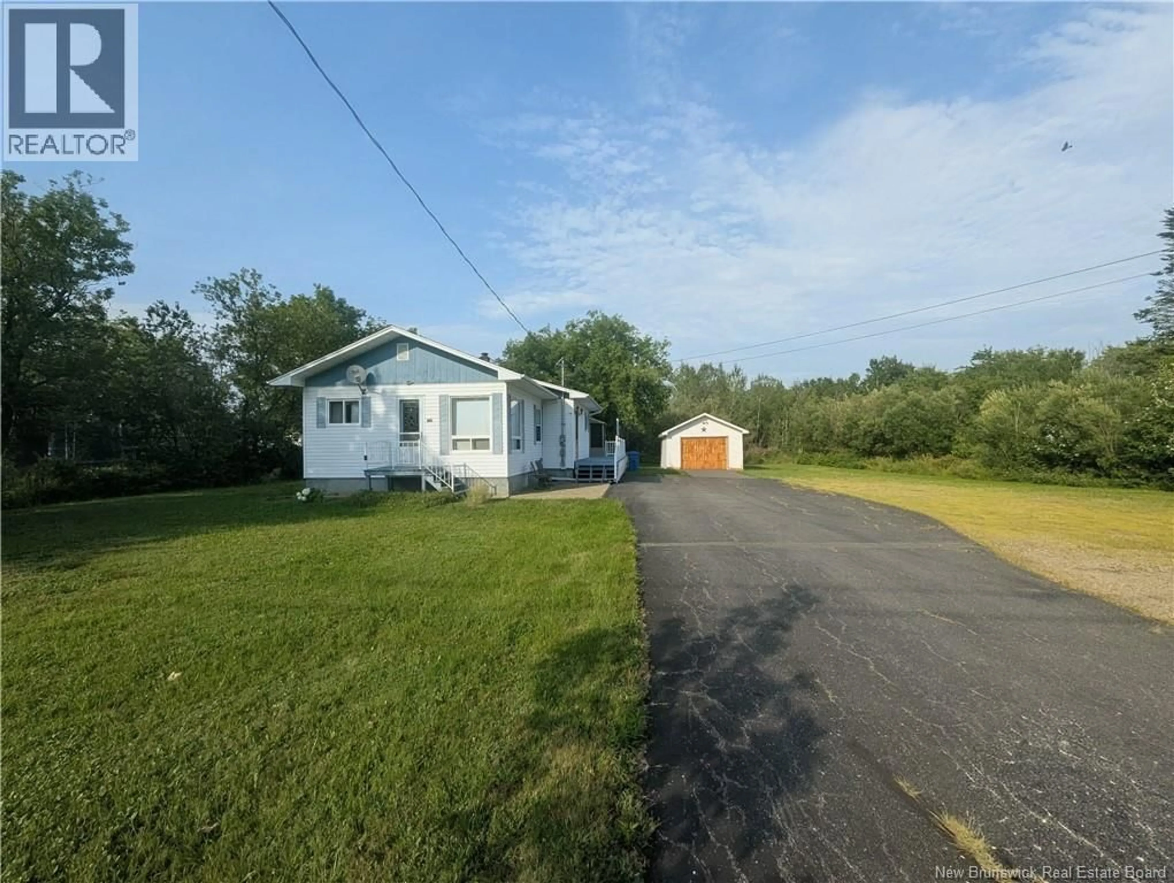 A pic from outside/outdoor area/front of a property/back of a property/a pic from drone, street for 2625 MIRAMICHI, Bathurst New Brunswick E2A6K1