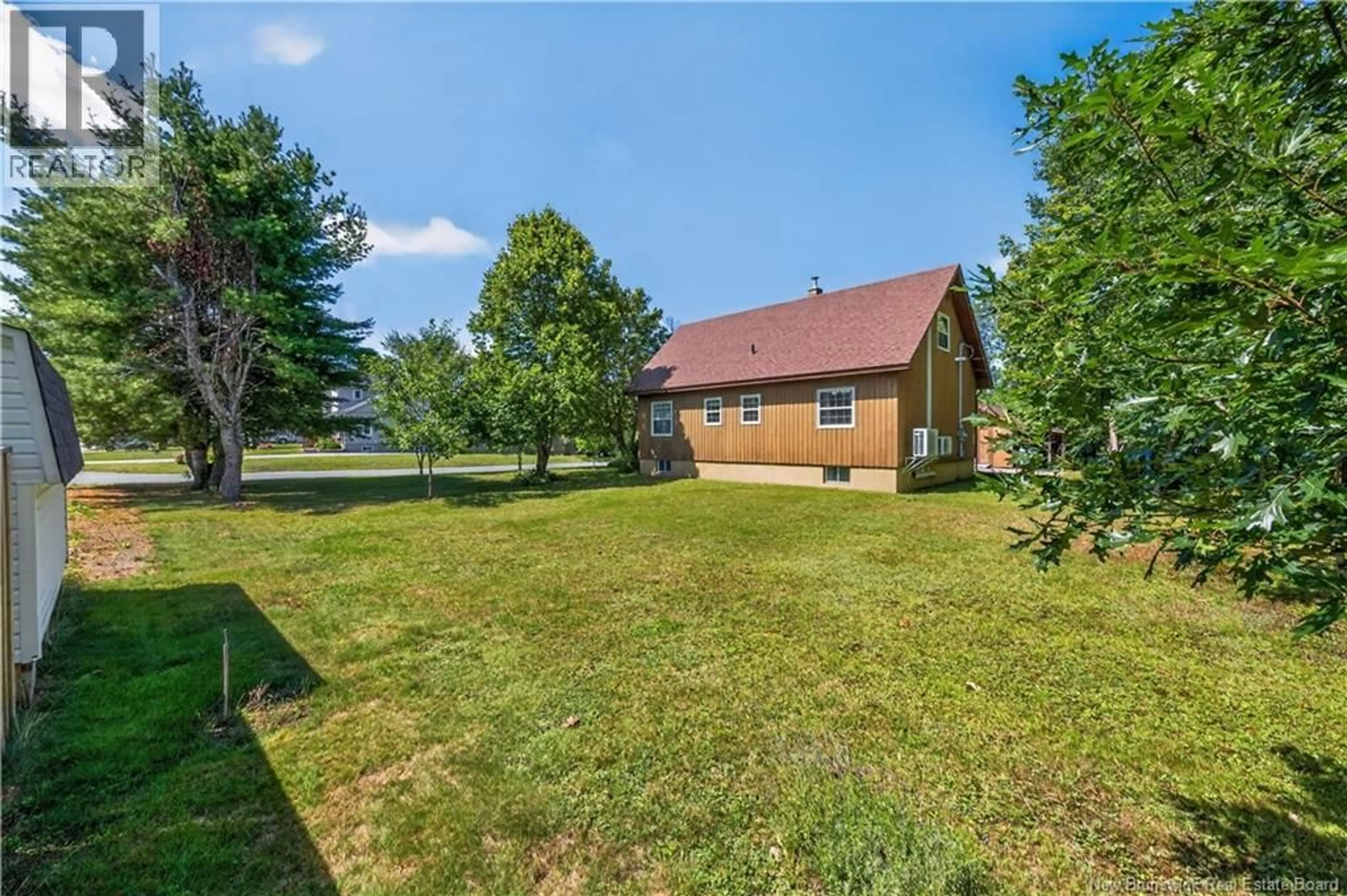 A pic from outside/outdoor area/front of a property/back of a property/a pic from drone, water/lake/river/ocean view for 132 PAULA AVENUE, Miramichi New Brunswick E1V3R3