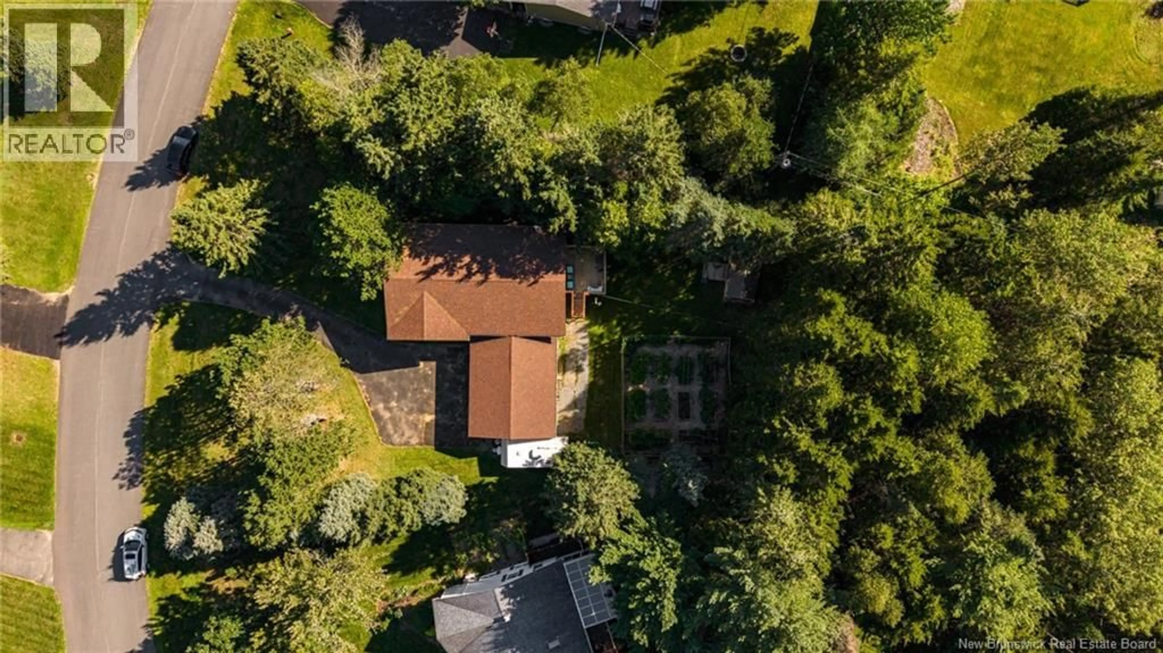A pic from outside/outdoor area/front of a property/back of a property/a pic from drone, unknown for 5 BEL-AIR DRIVE, Rothesay New Brunswick E2E4Y1