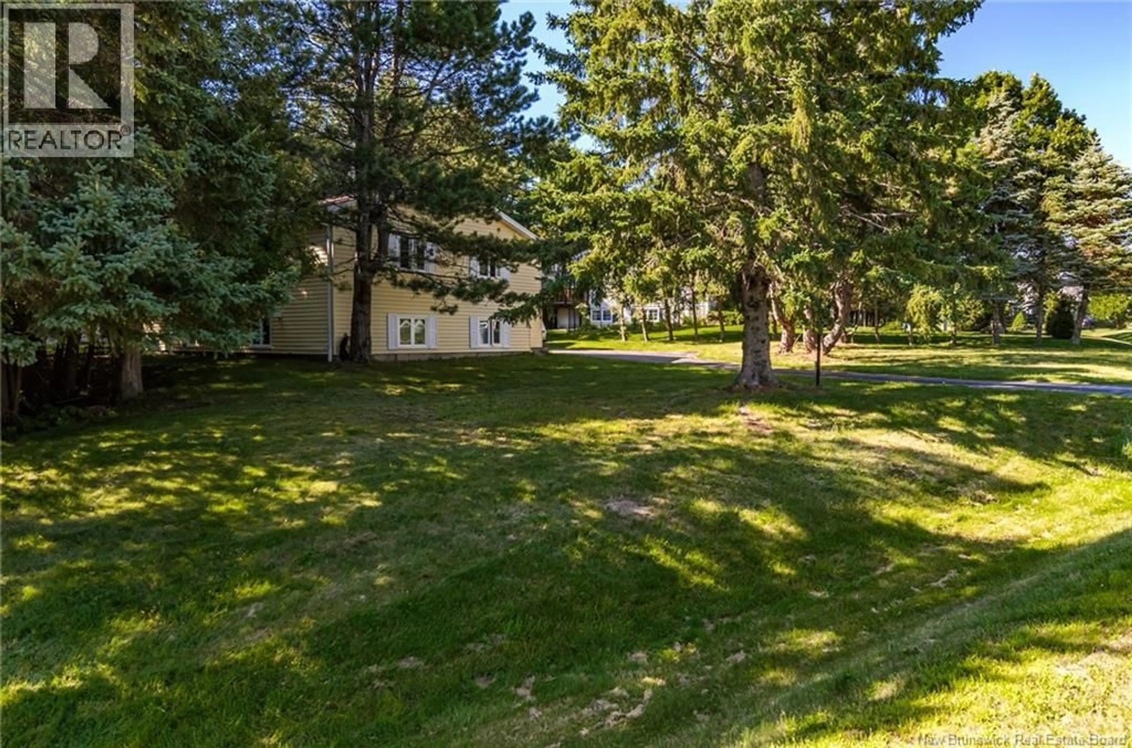 A pic from outside/outdoor area/front of a property/back of a property/a pic from drone, forest/trees view for 5 BEL-AIR DRIVE, Rothesay New Brunswick E2E4Y1