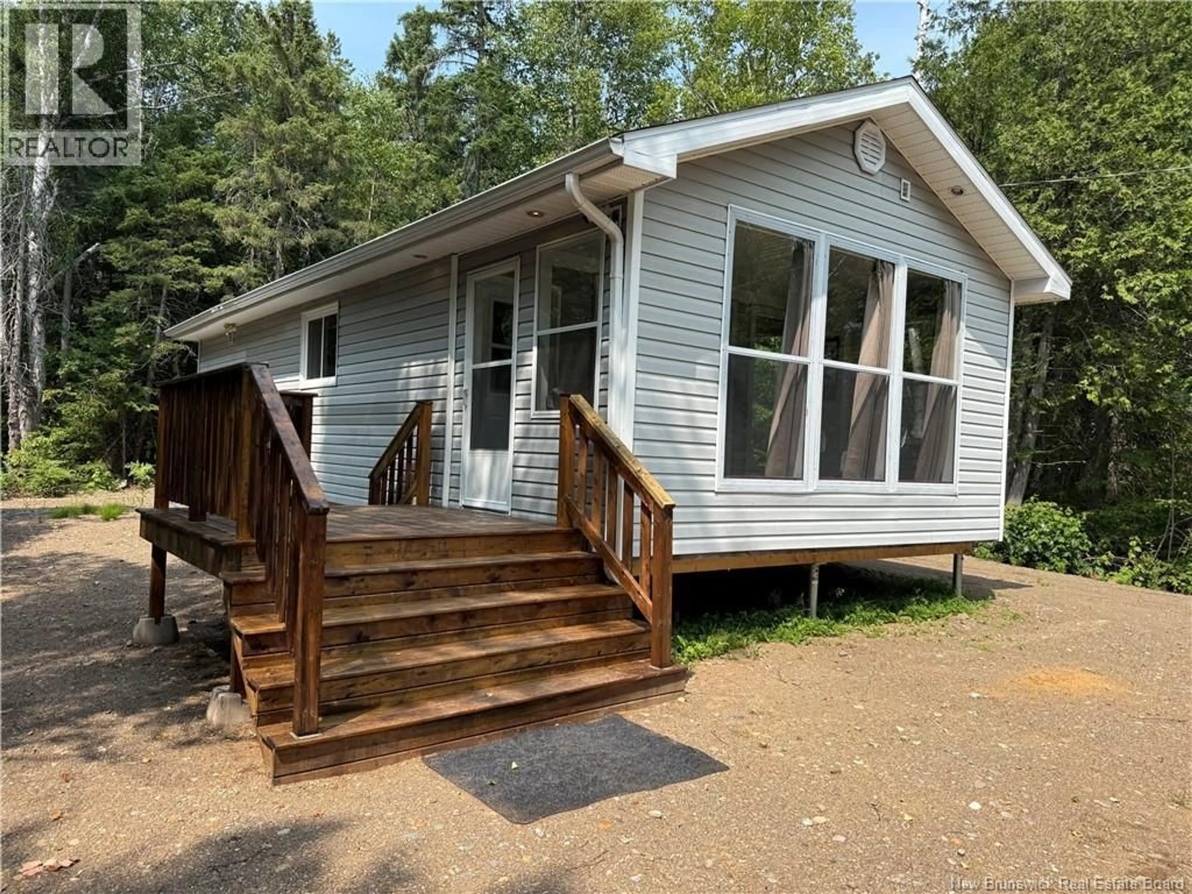 Home with vinyl exterior material, street for 1660 CH ROBERTVILLE, Robertville New Brunswick E8K2T1