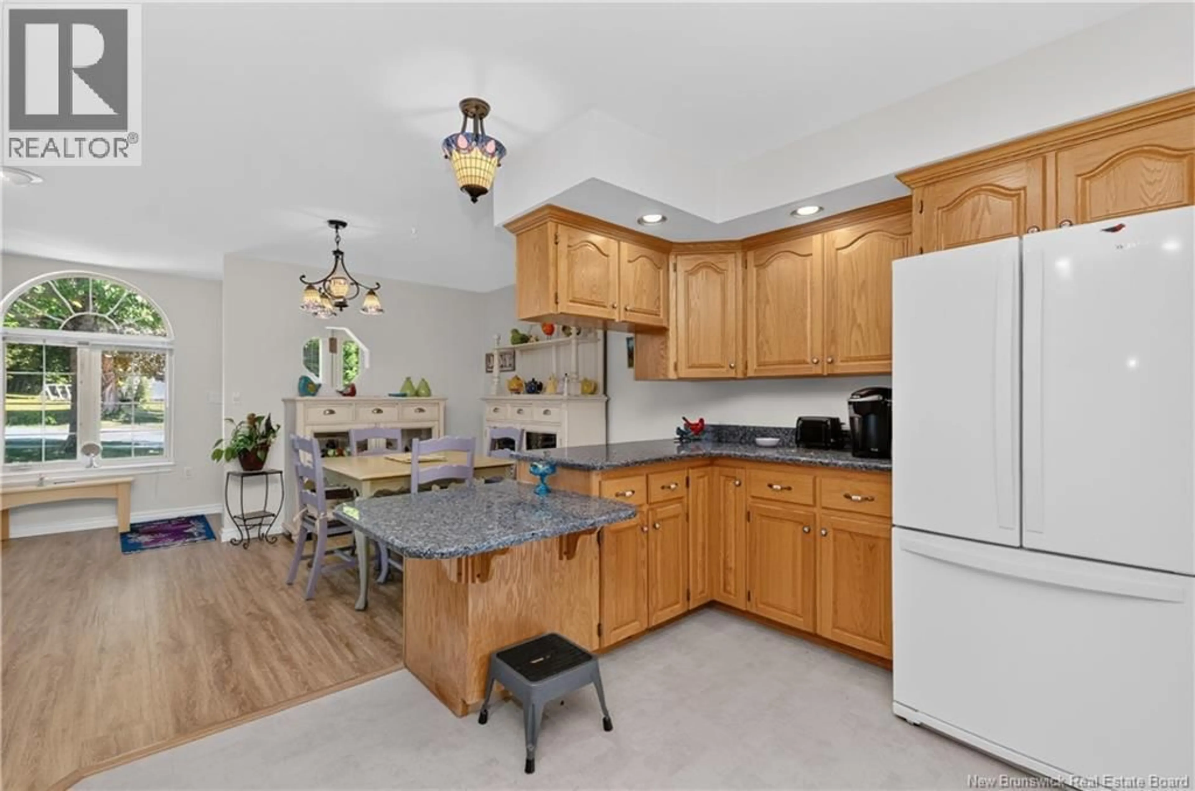 Open concept kitchen, ceramic/tile floor for A - 61 PRINCE WILLIAM ST, St. Stephen New Brunswick E3L1S5