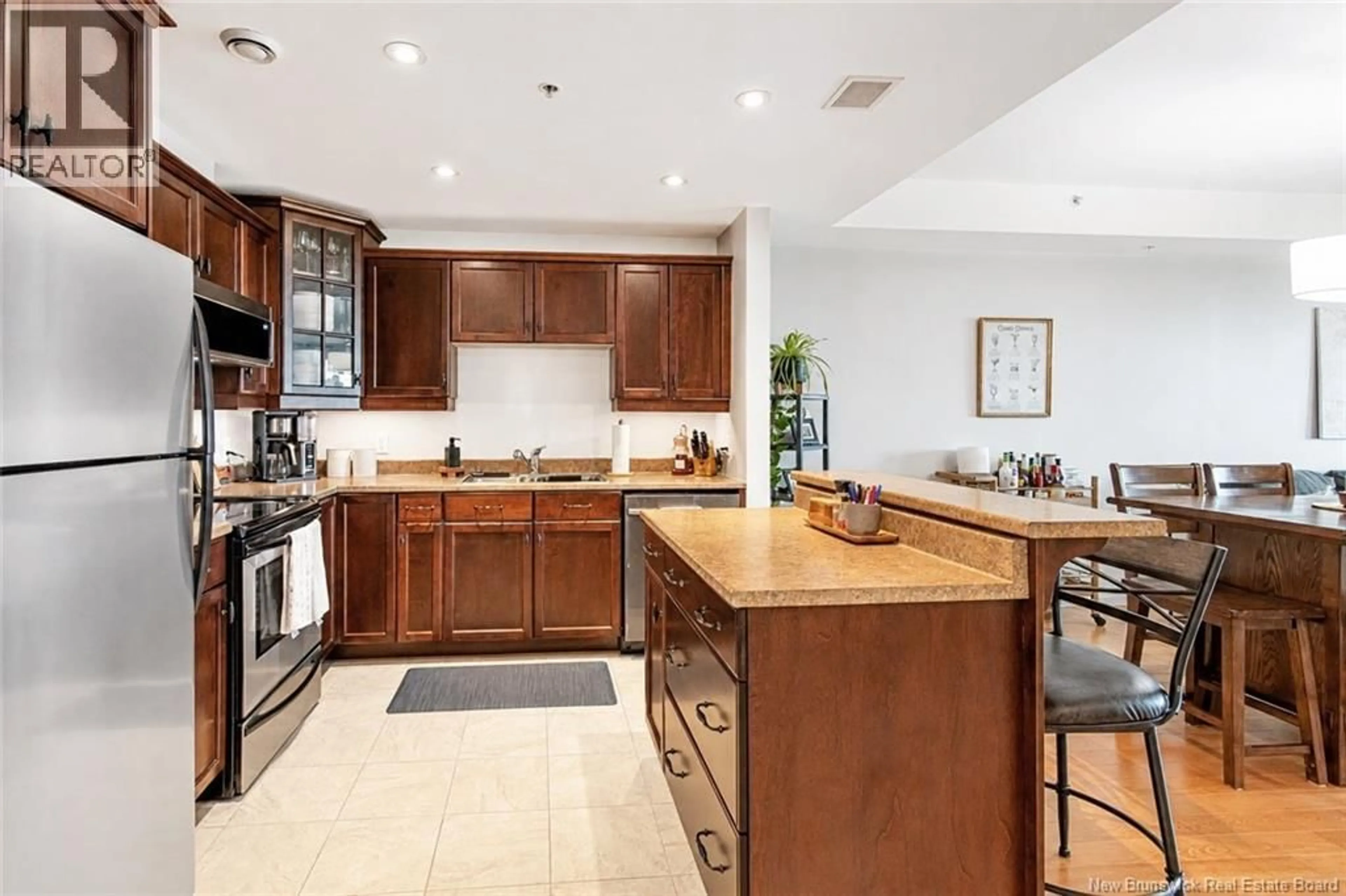 Open concept kitchen, ceramic/tile floor for 206 - 185 ROYAL OAKS BOULEVARD, Moncton New Brunswick E1H2P7