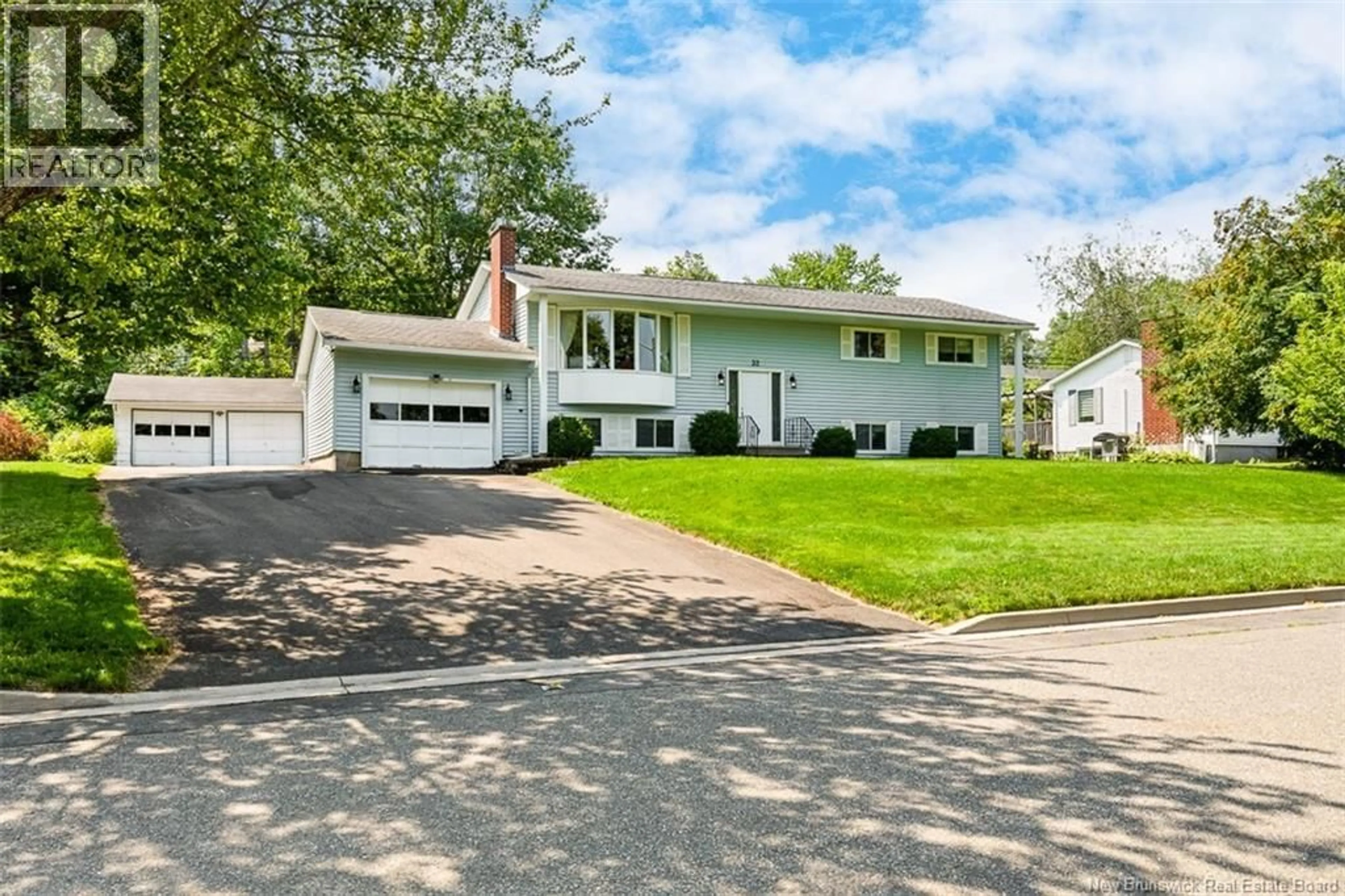 Home with vinyl exterior material, street for 32 TULIP STREET, Fredericton New Brunswick E3C1L2