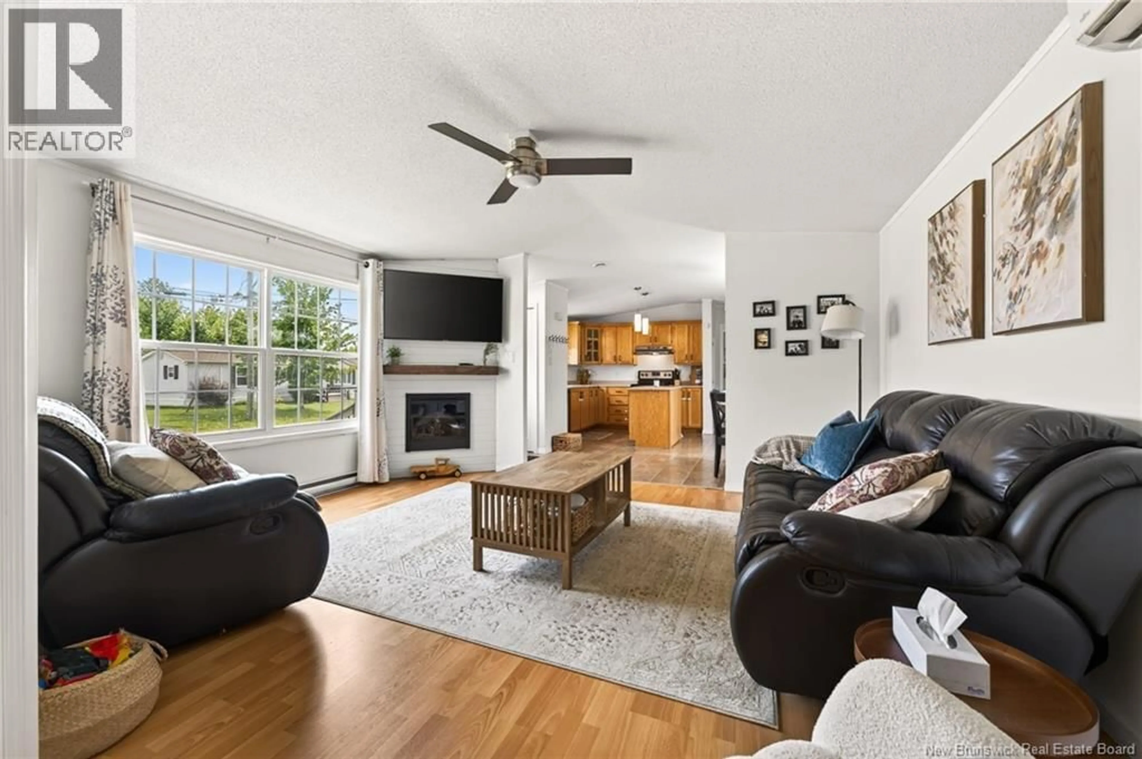 Living room with furniture, unknown for 19 VERCASCA COURT, Moncton New Brunswick E1H3P9