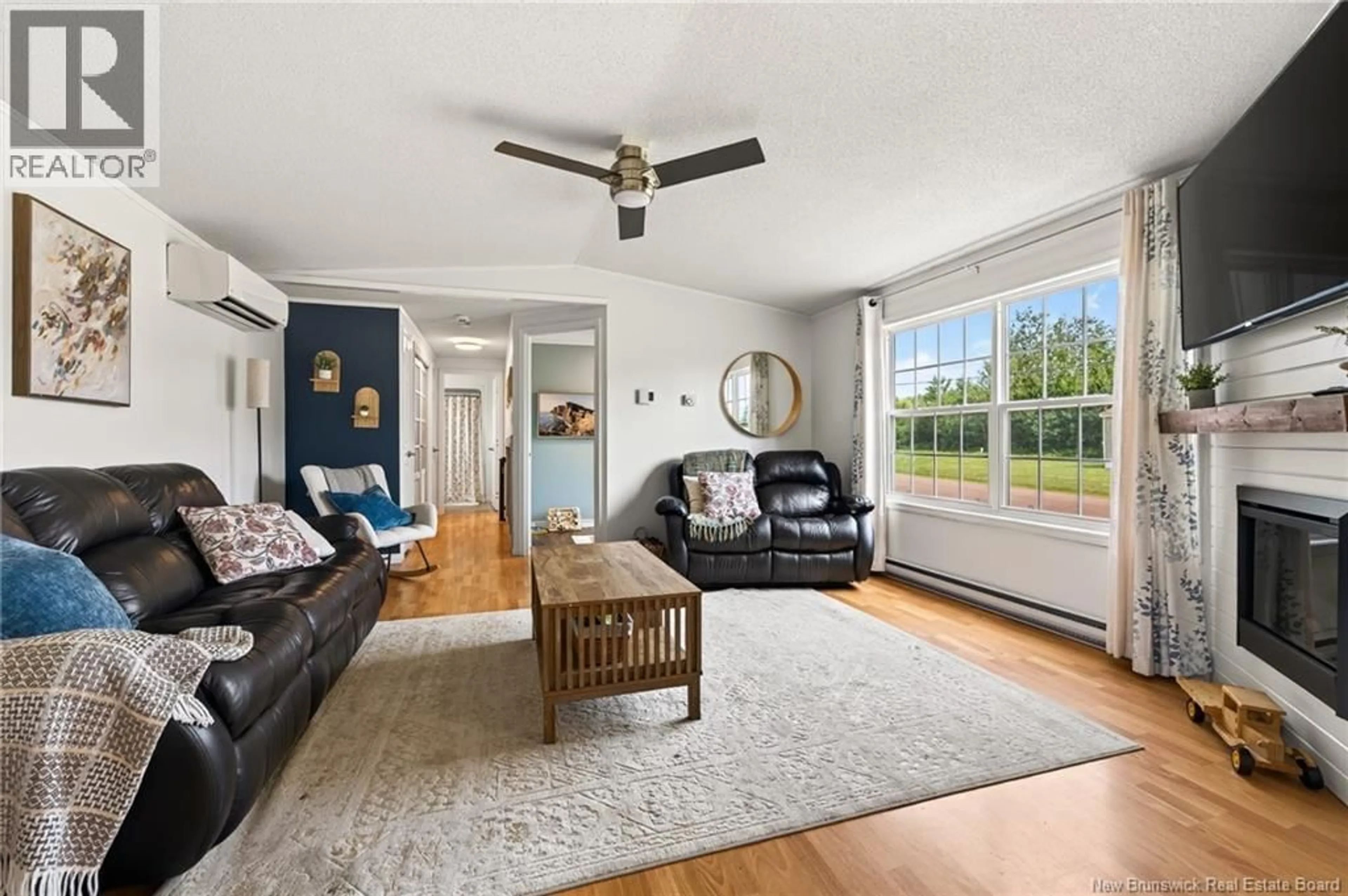 Living room with furniture, unknown for 19 VERCASCA COURT, Moncton New Brunswick E1H3P9