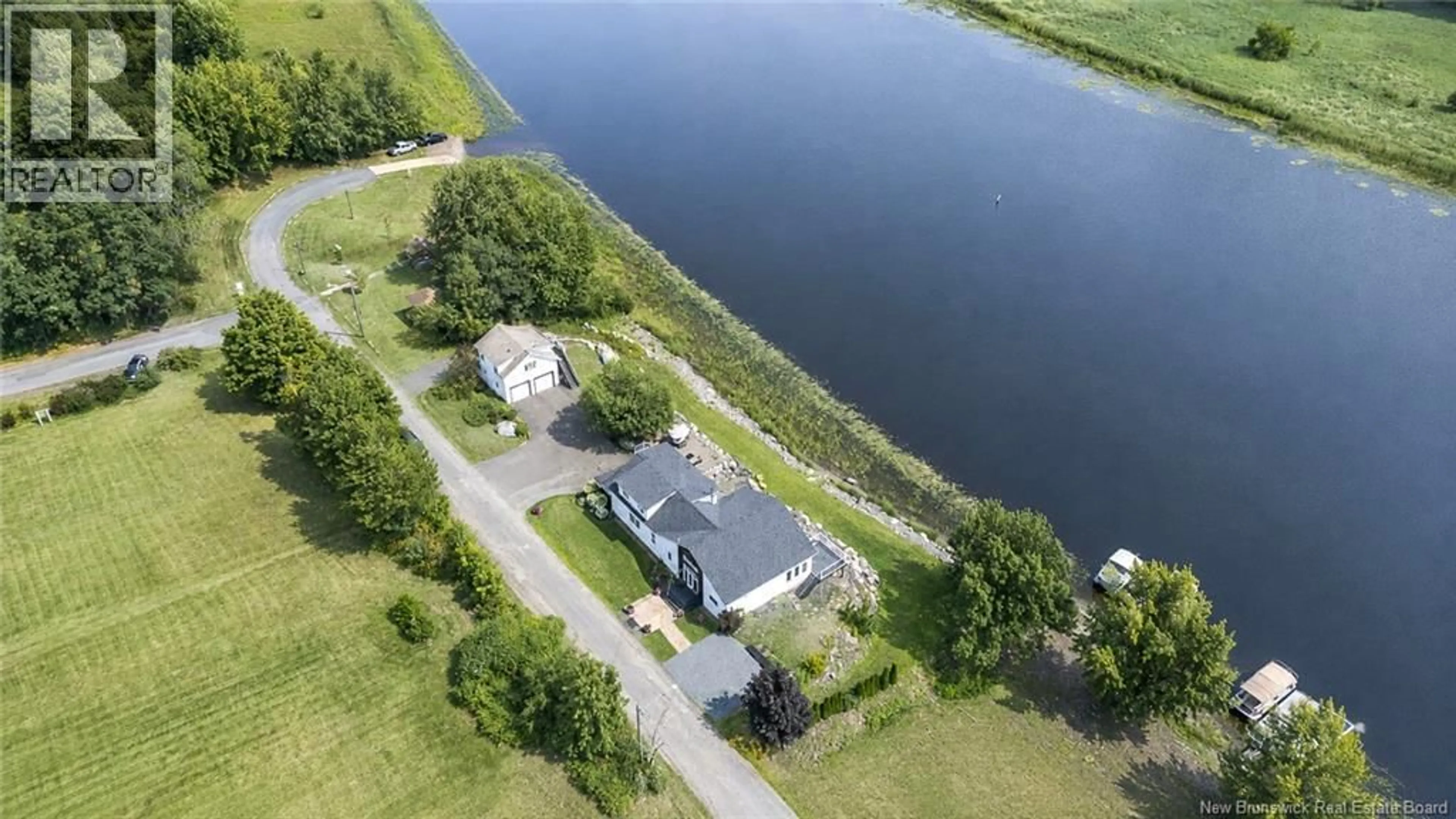 A pic from outside/outdoor area/front of a property/back of a property/a pic from drone, water/lake/river/ocean view for 92 FRONT STREET, Gagetown New Brunswick E5M1A1