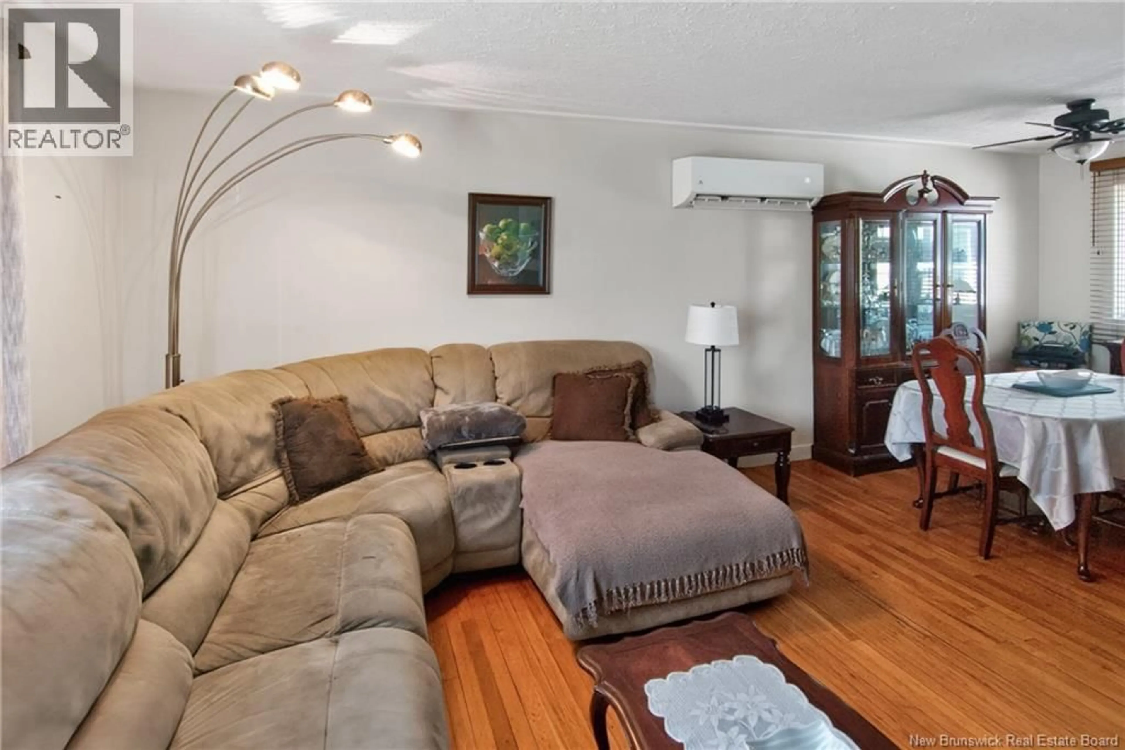 Living room with furniture, wood/laminate floor for 88 WALSH STREET, Moncton New Brunswick E1C6W8