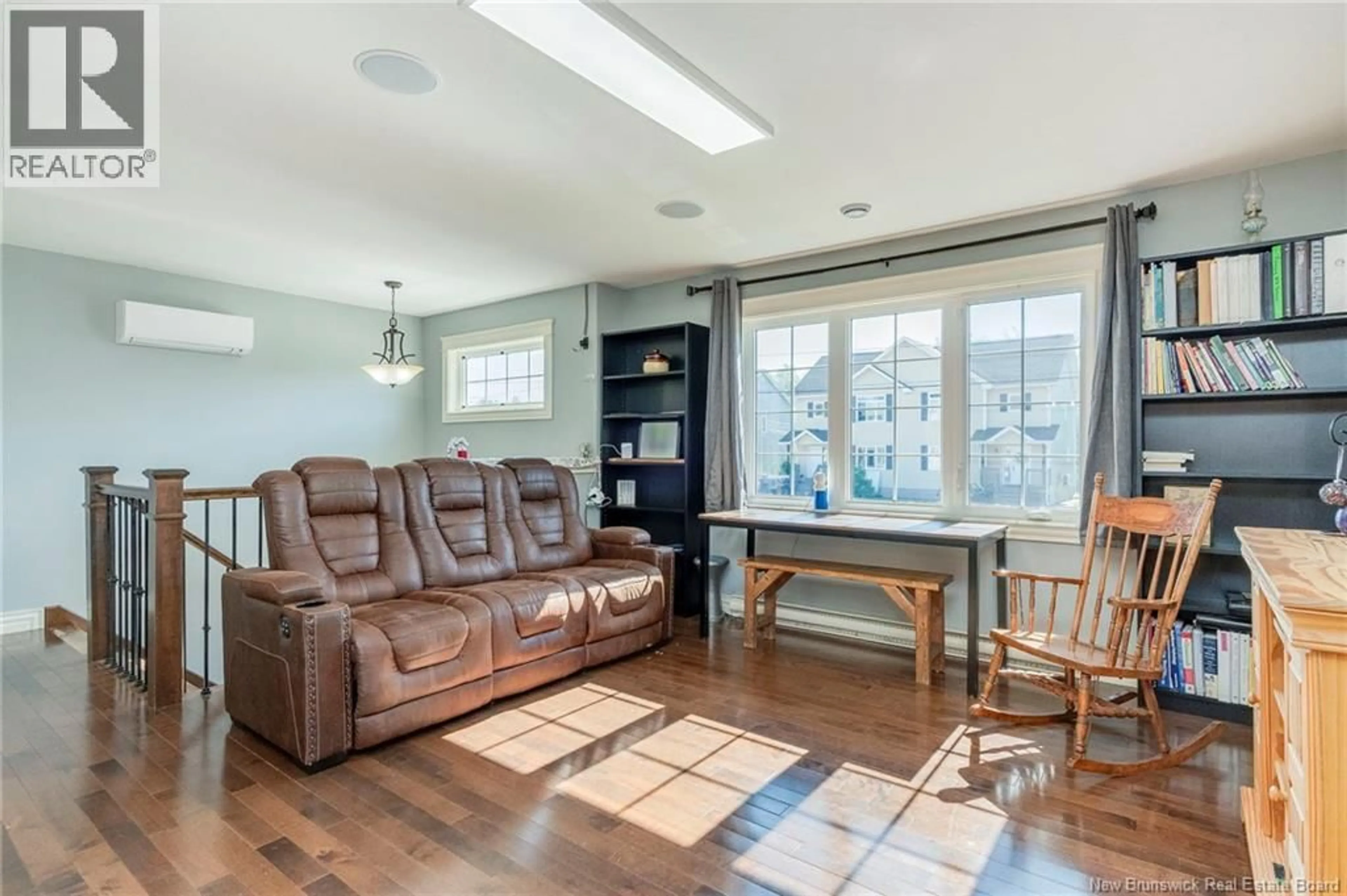 Living room with furniture, wood/laminate floor for 39 WHISPERWOOD DRIVE, Moncton New Brunswick E1G0P7