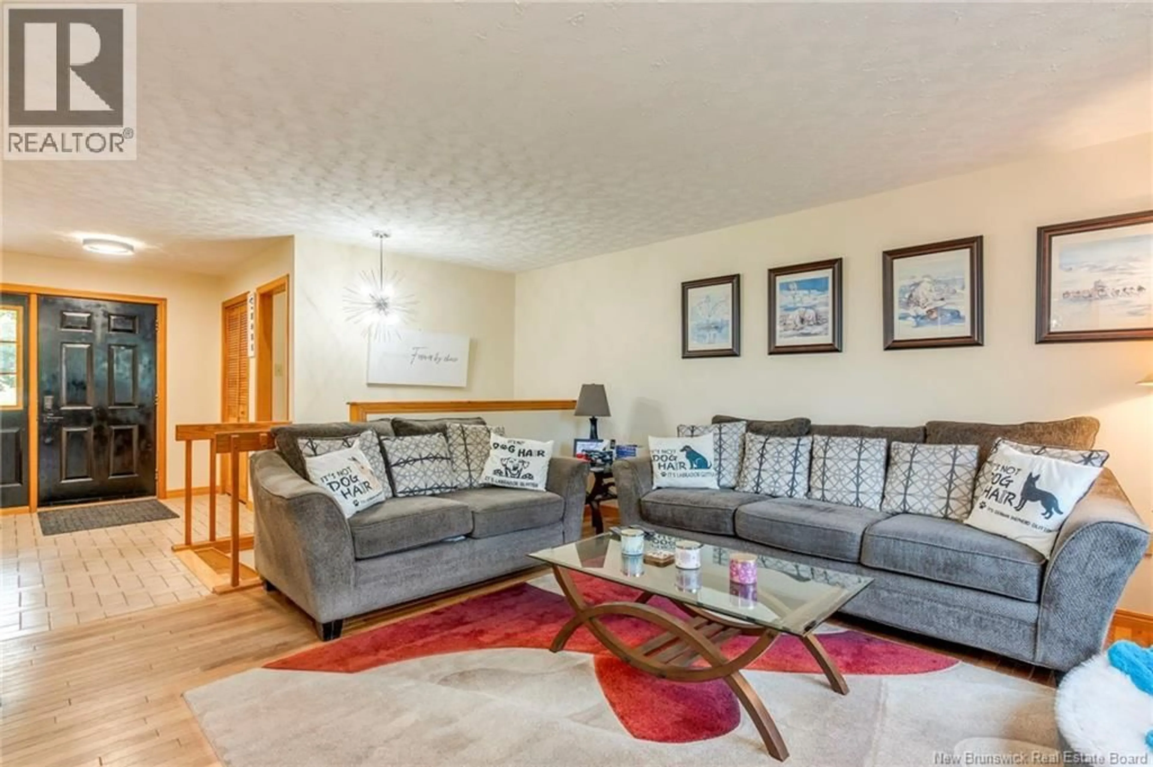 Living room with furniture, unknown for 4 ASHWOOD COURT, Quispamsis New Brunswick E2E1V5