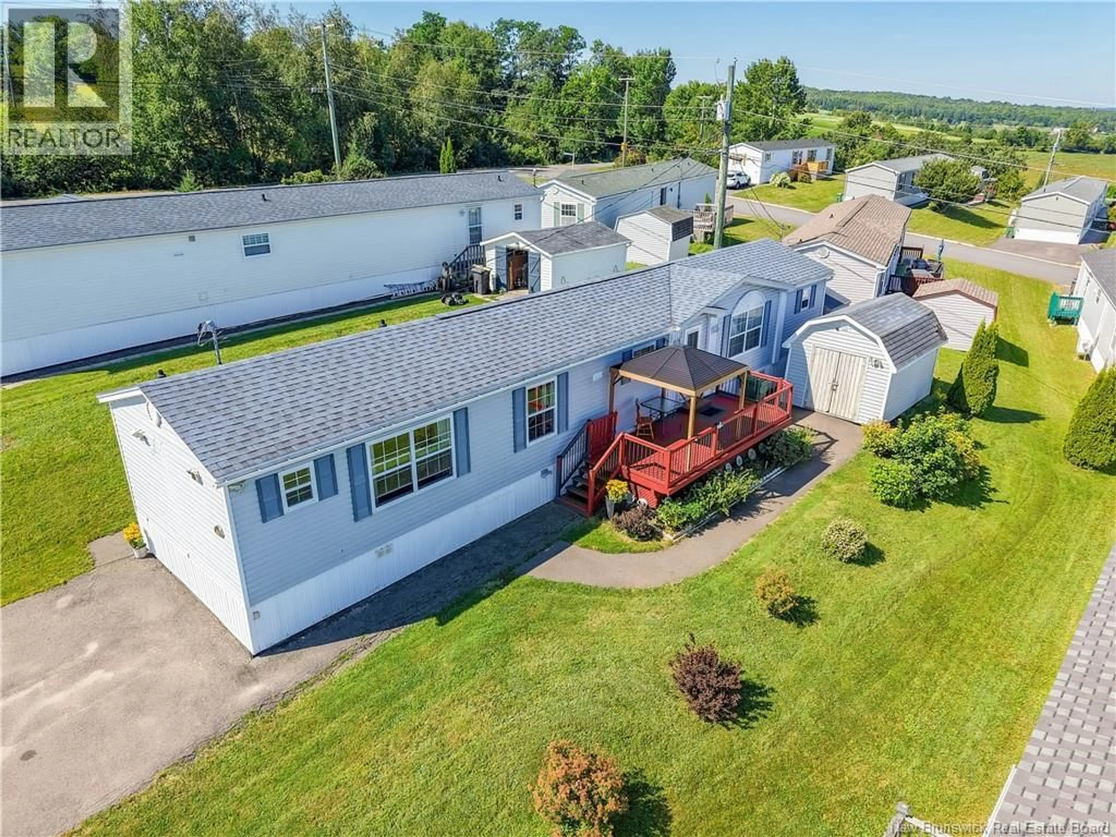 A pic from outside/outdoor area/front of a property/back of a property/a pic from drone, unknown for 11 SENATOR DRIVE, Fredericton New Brunswick E3C1L8