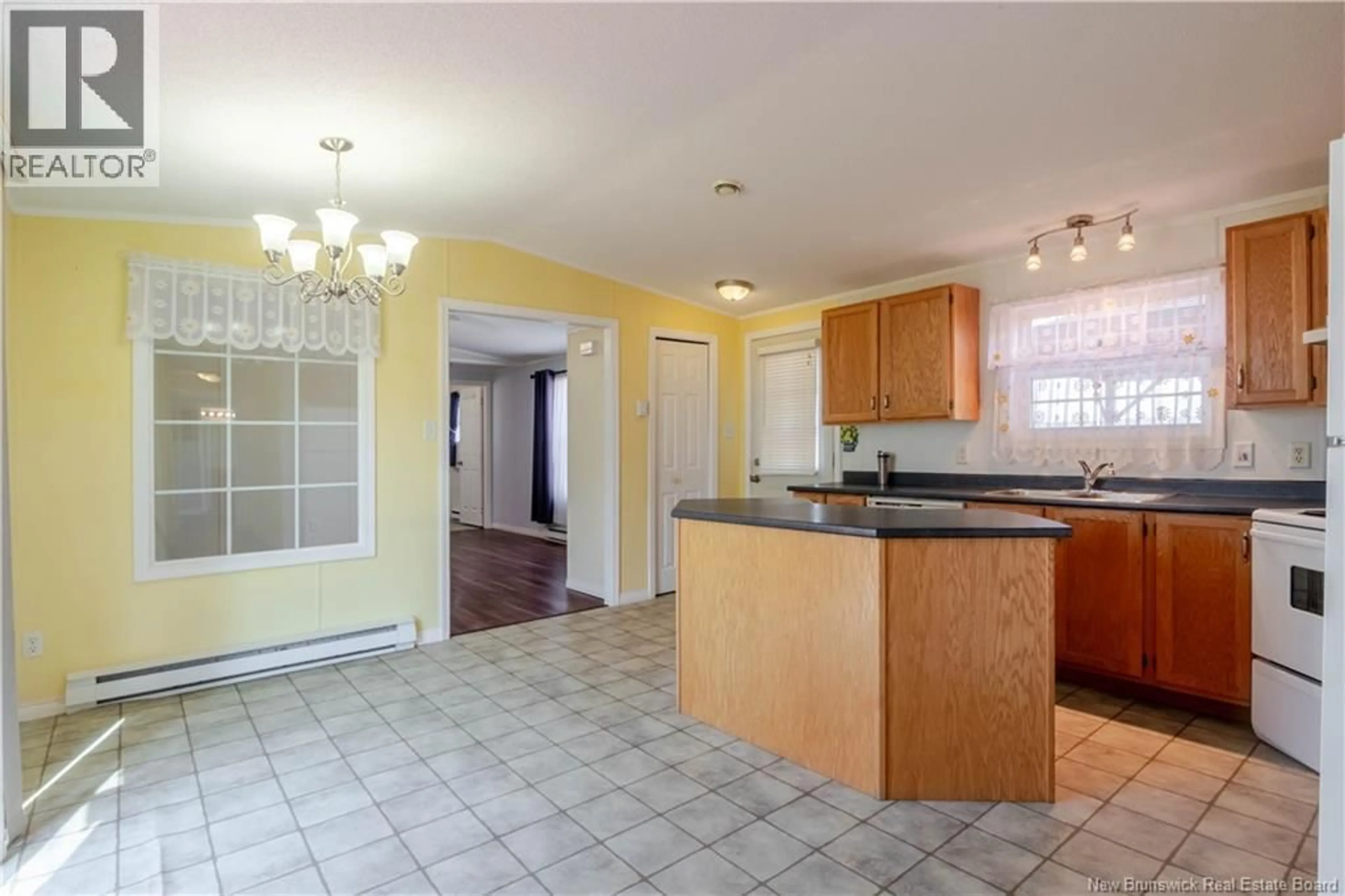 Open concept kitchen, unknown for 11 SENATOR DRIVE, Fredericton New Brunswick E3C1L8