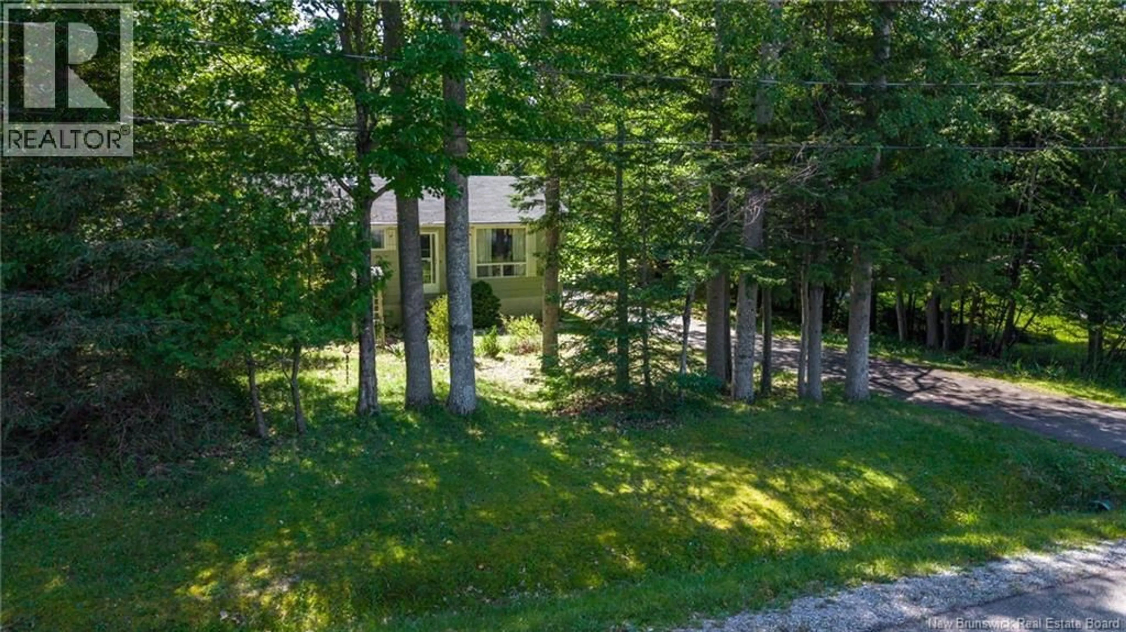 A pic from outside/outdoor area/front of a property/back of a property/a pic from drone, forest/trees view for 1 PARKWOOD DRIVE, Quispamsis New Brunswick E2E1P4