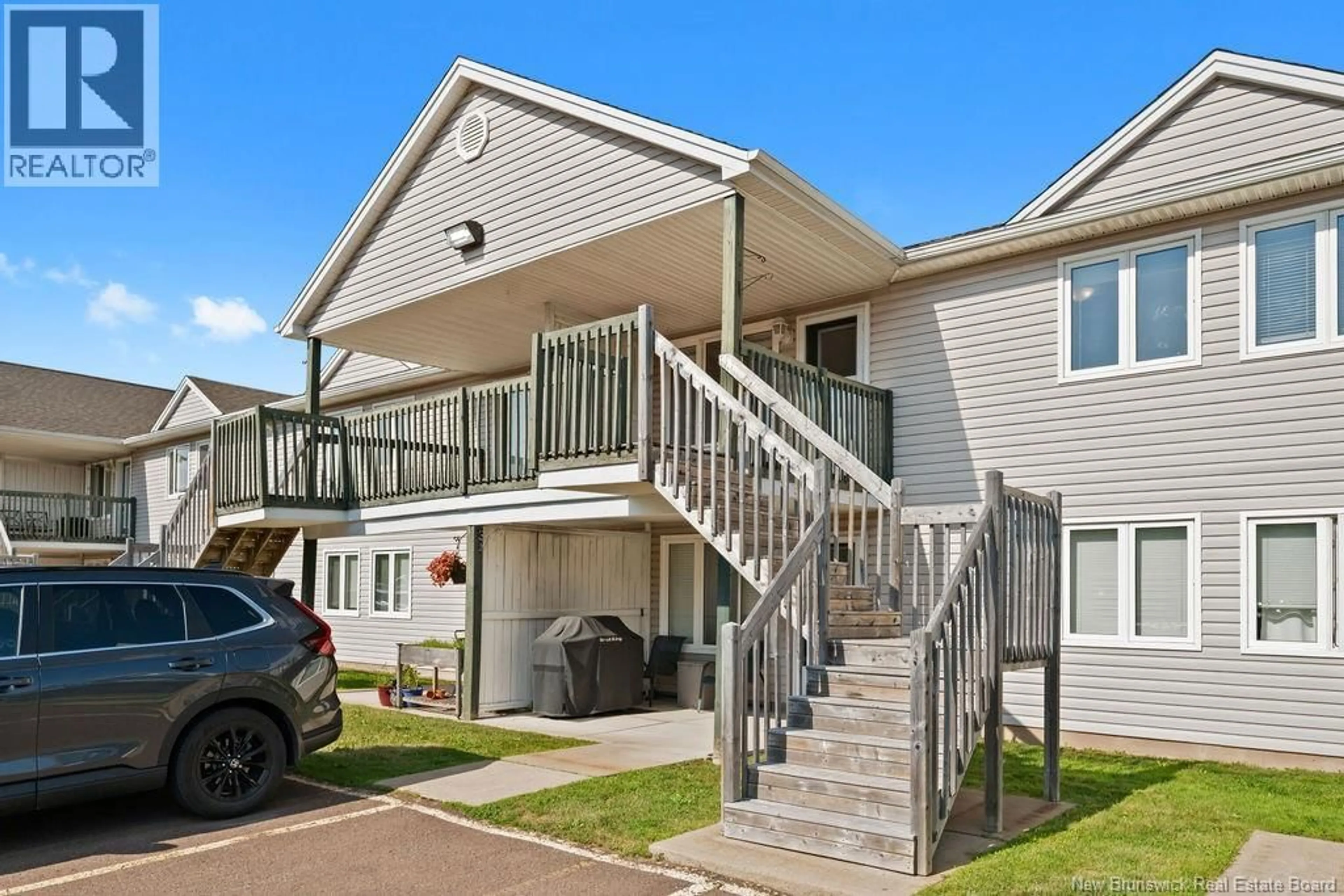 Home with vinyl exterior material, street for 27 - 30 GRANT STREET, Moncton New Brunswick E1A3R4